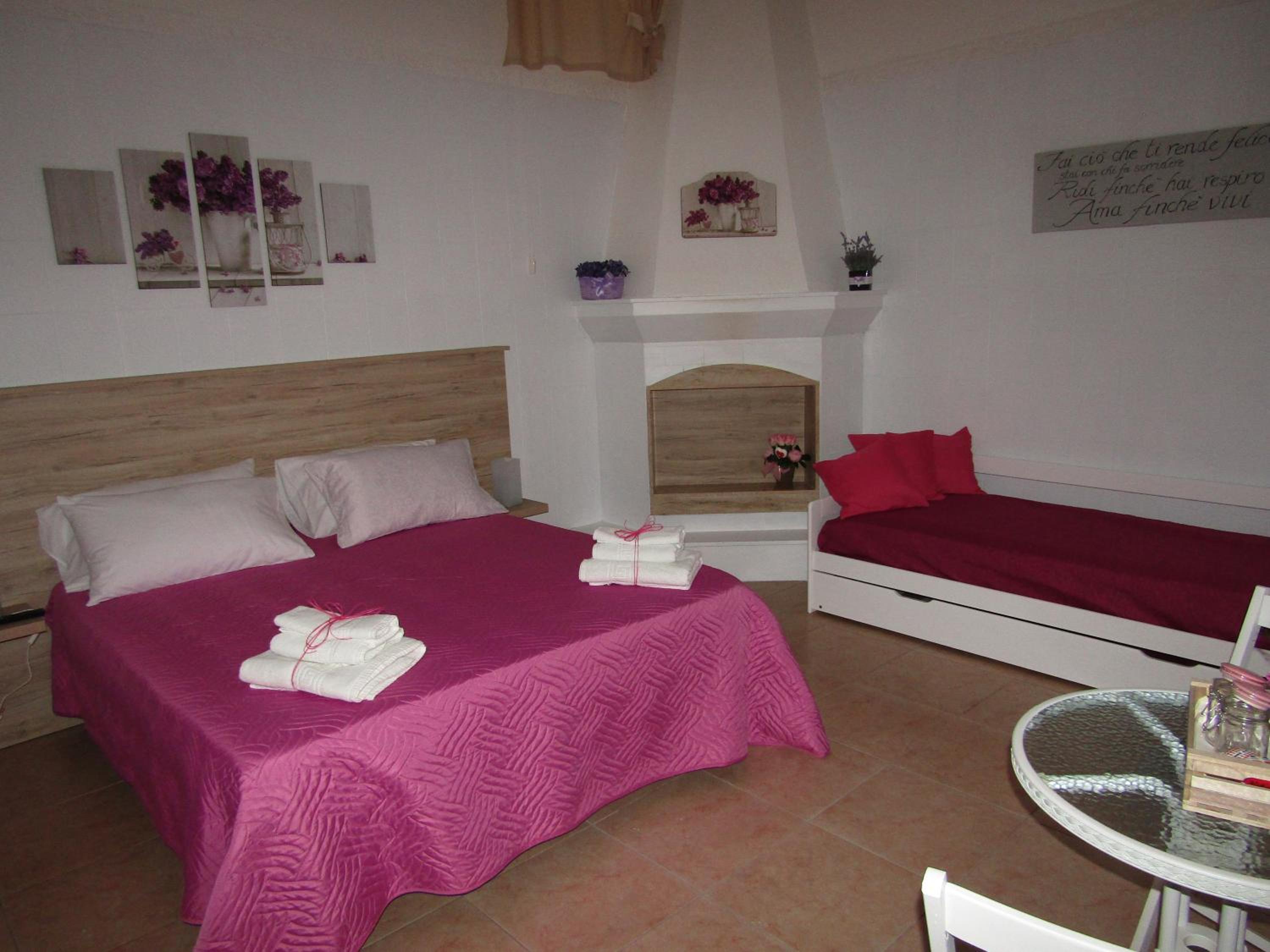 up en Carosino — hotel room