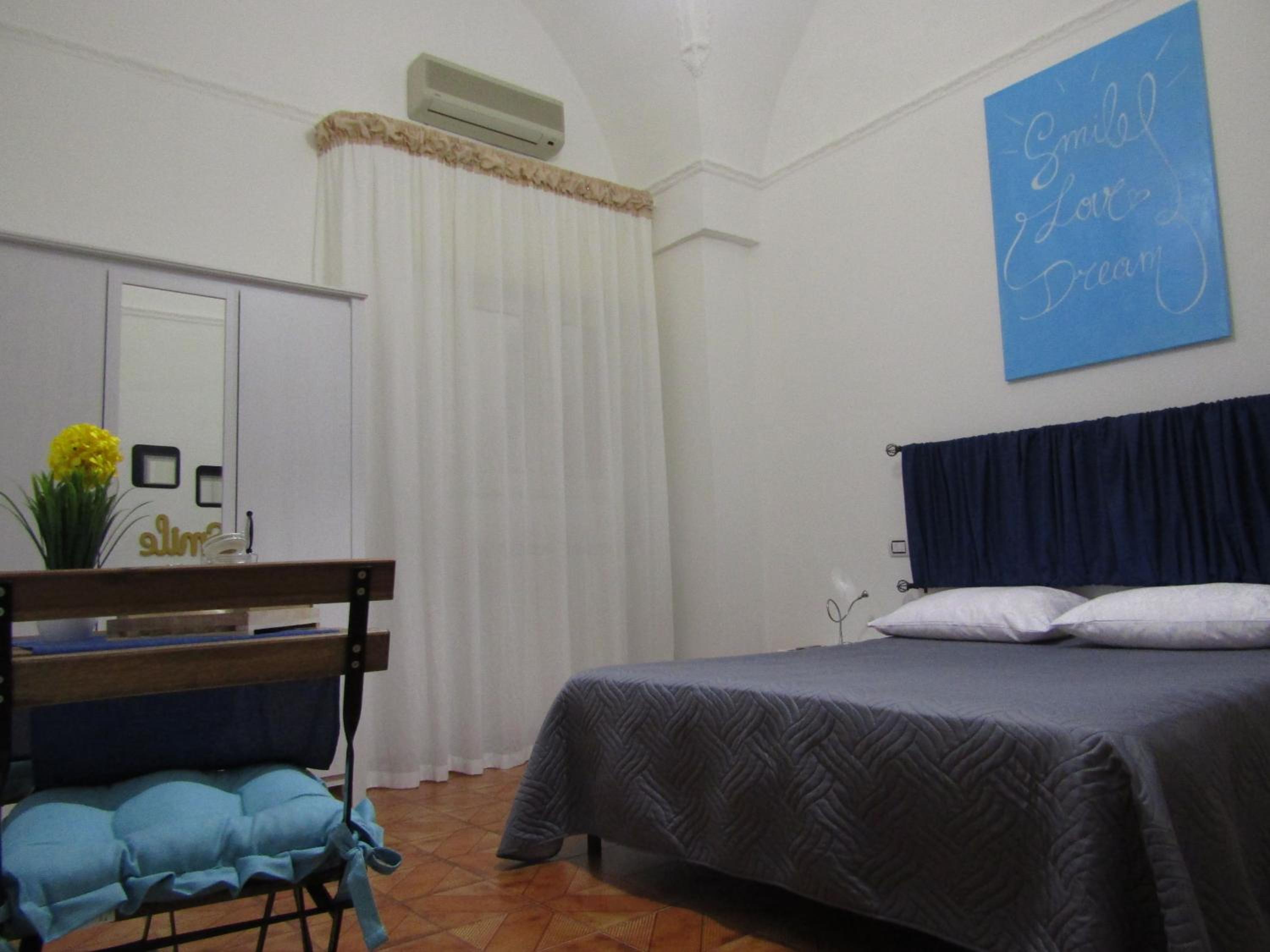 up en Carosino — hotel room