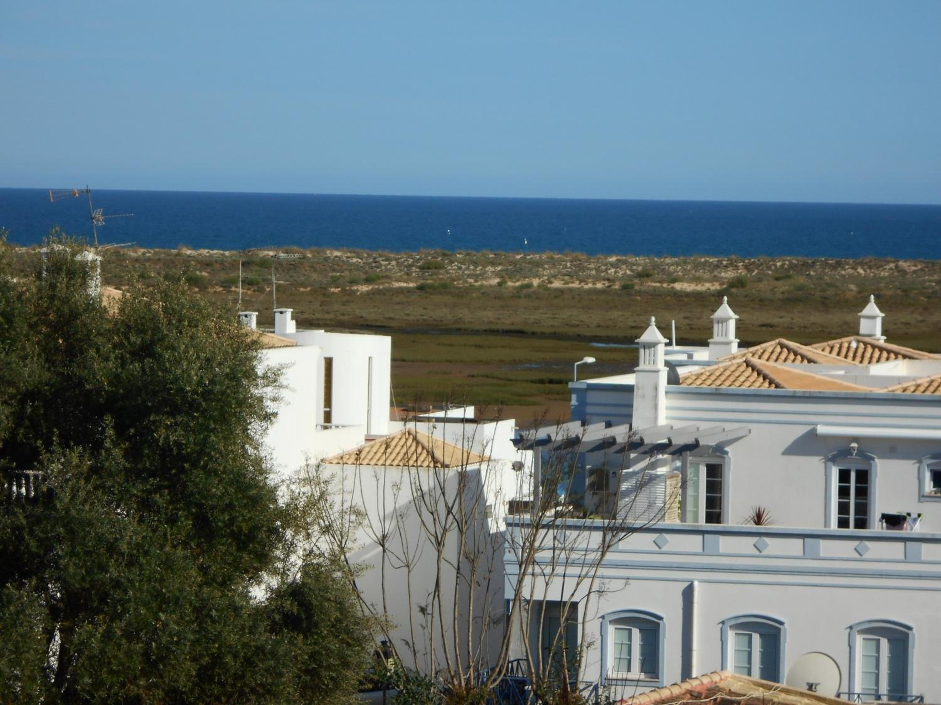 Central apartment-terrace and pool view 2