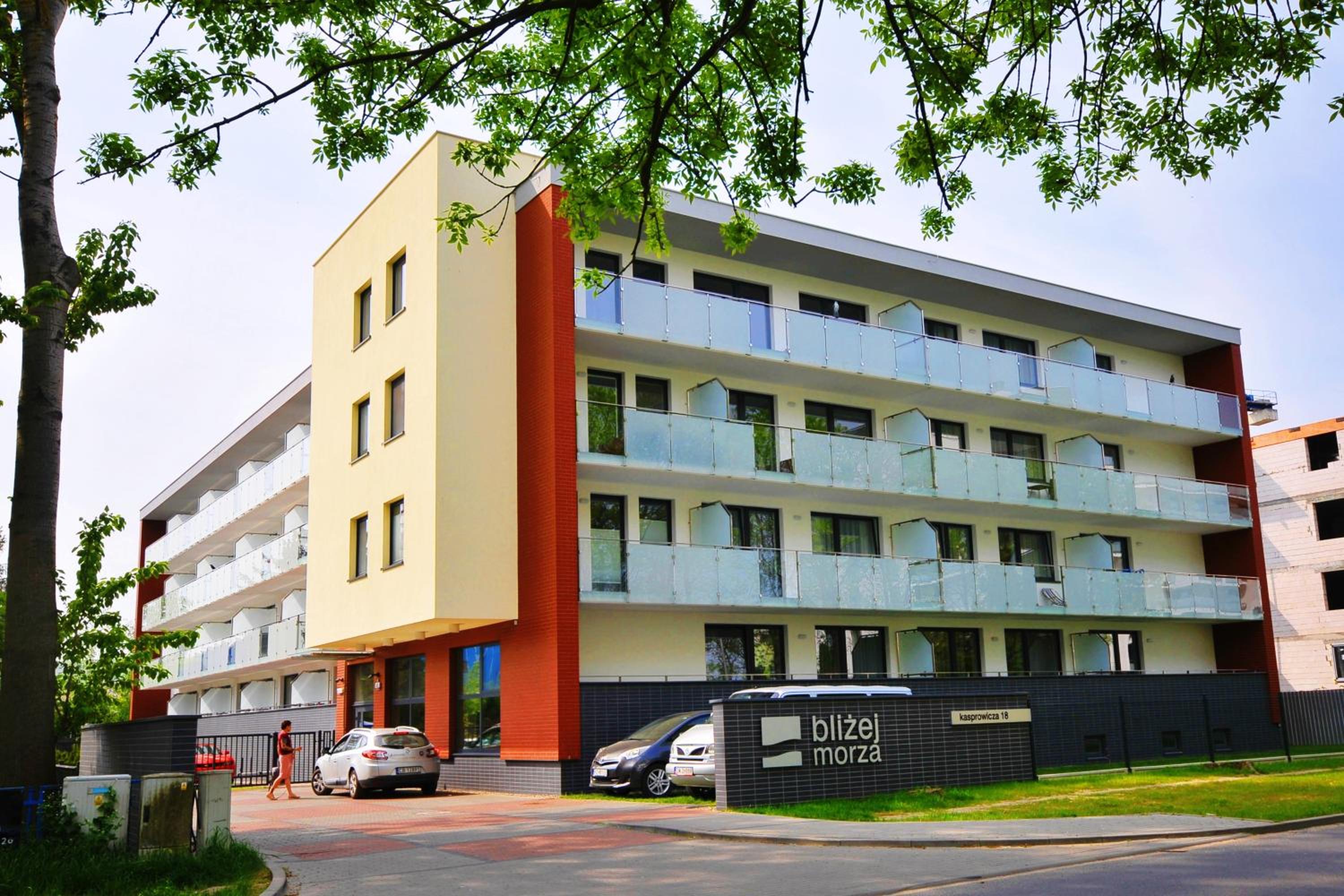 Grey & Green Apartments view 2