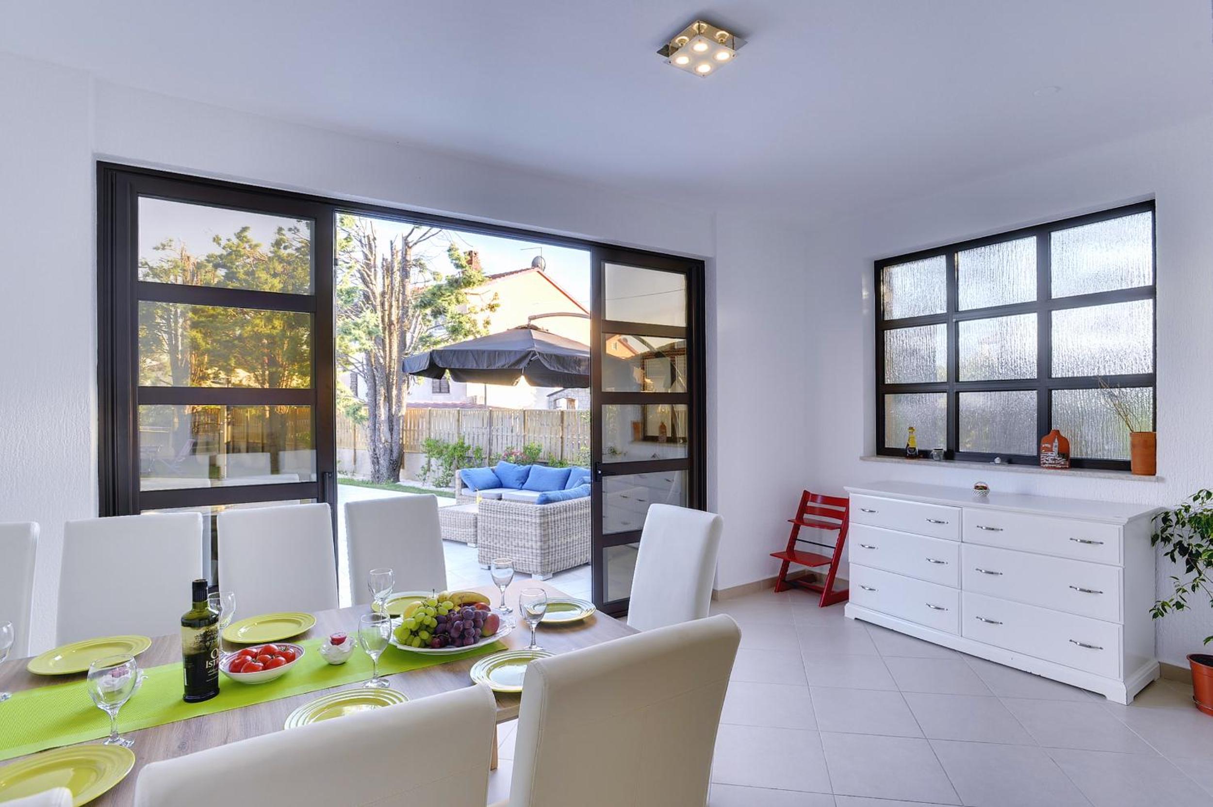 Villa Andrija Family Dream with heated pool at the sea with beautiful garden, outside cinema and kids playground