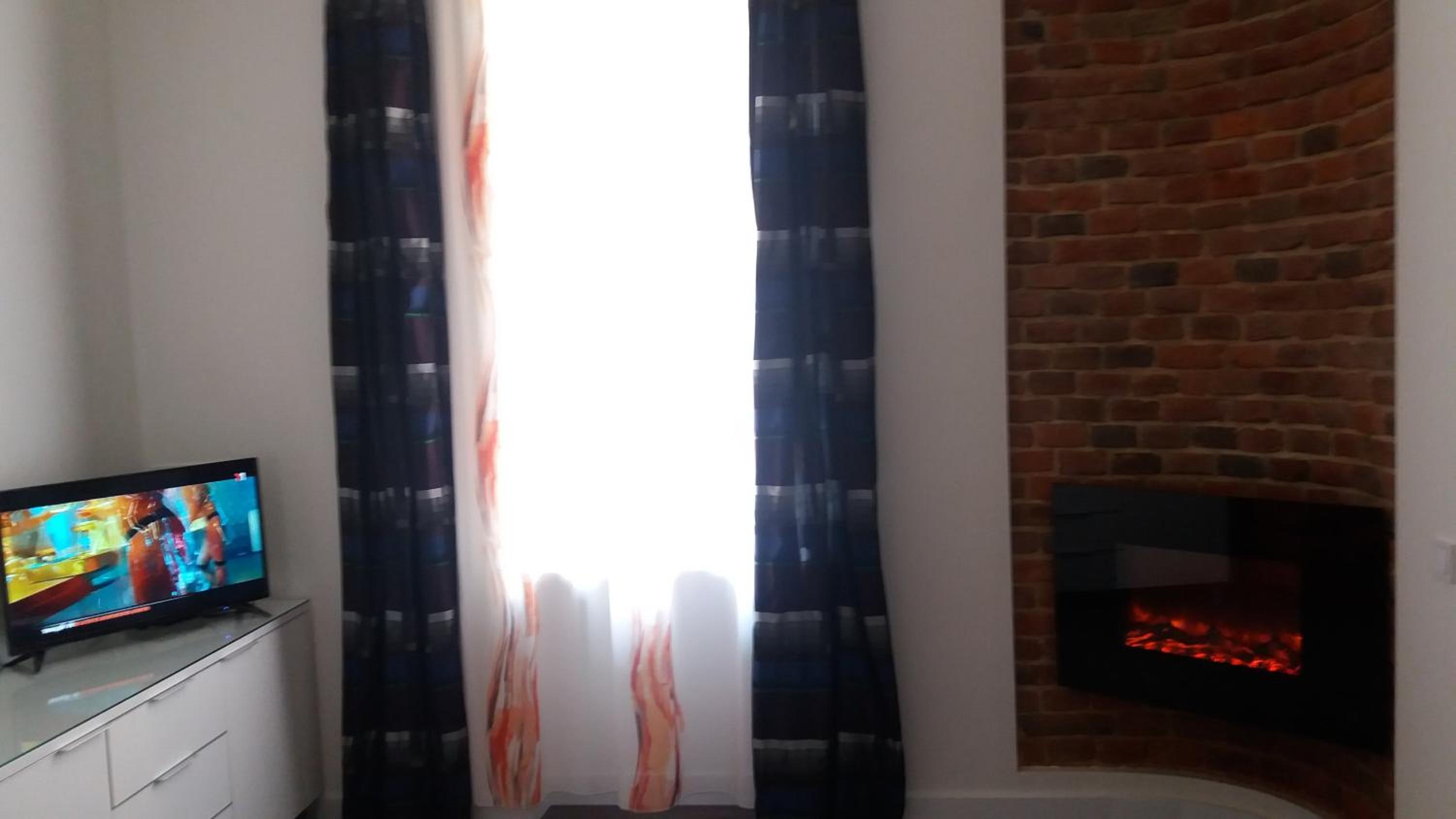 Apartment with fireplace view 4
