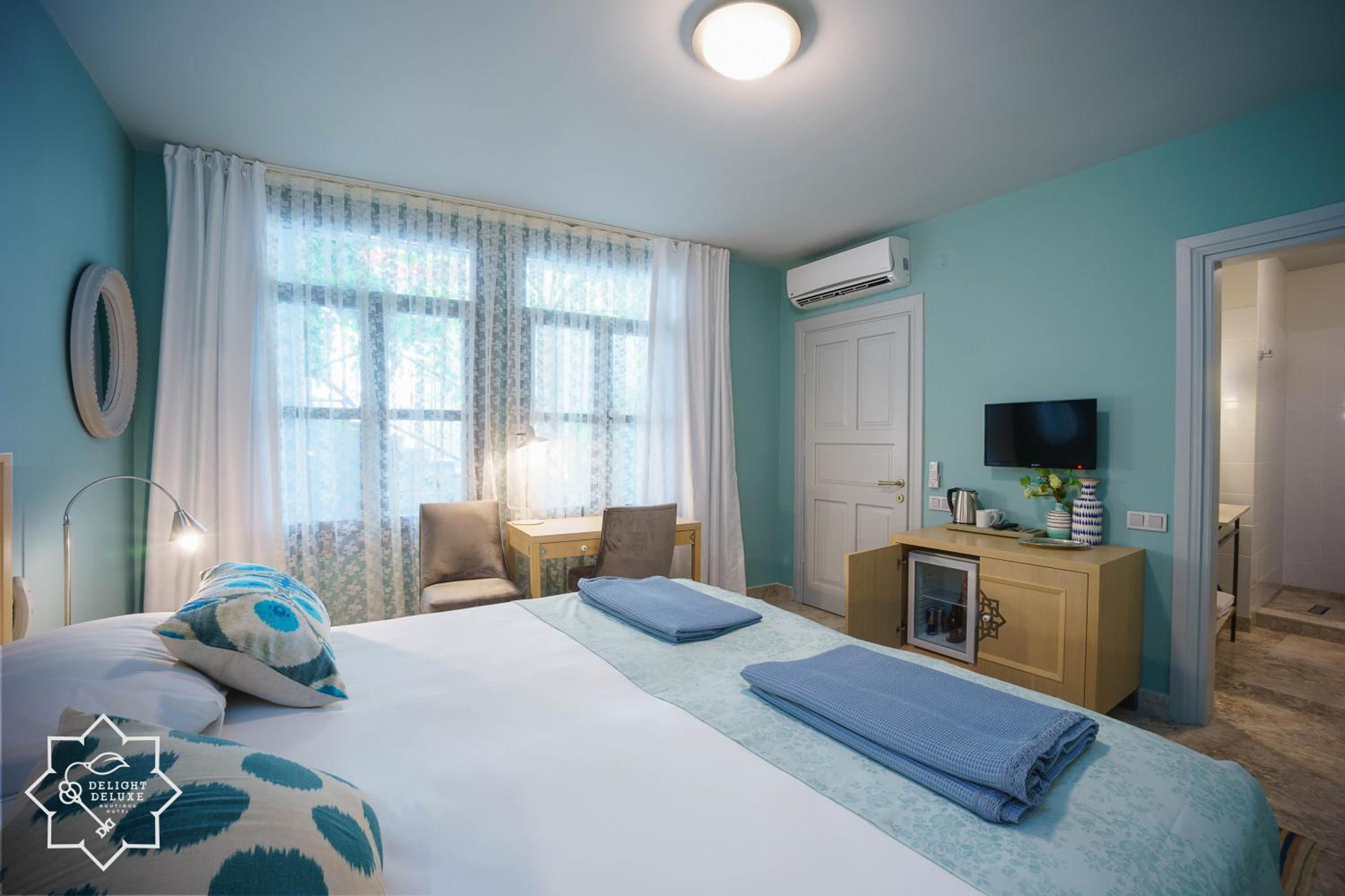 Delight Deluxe Hotel - Image 30