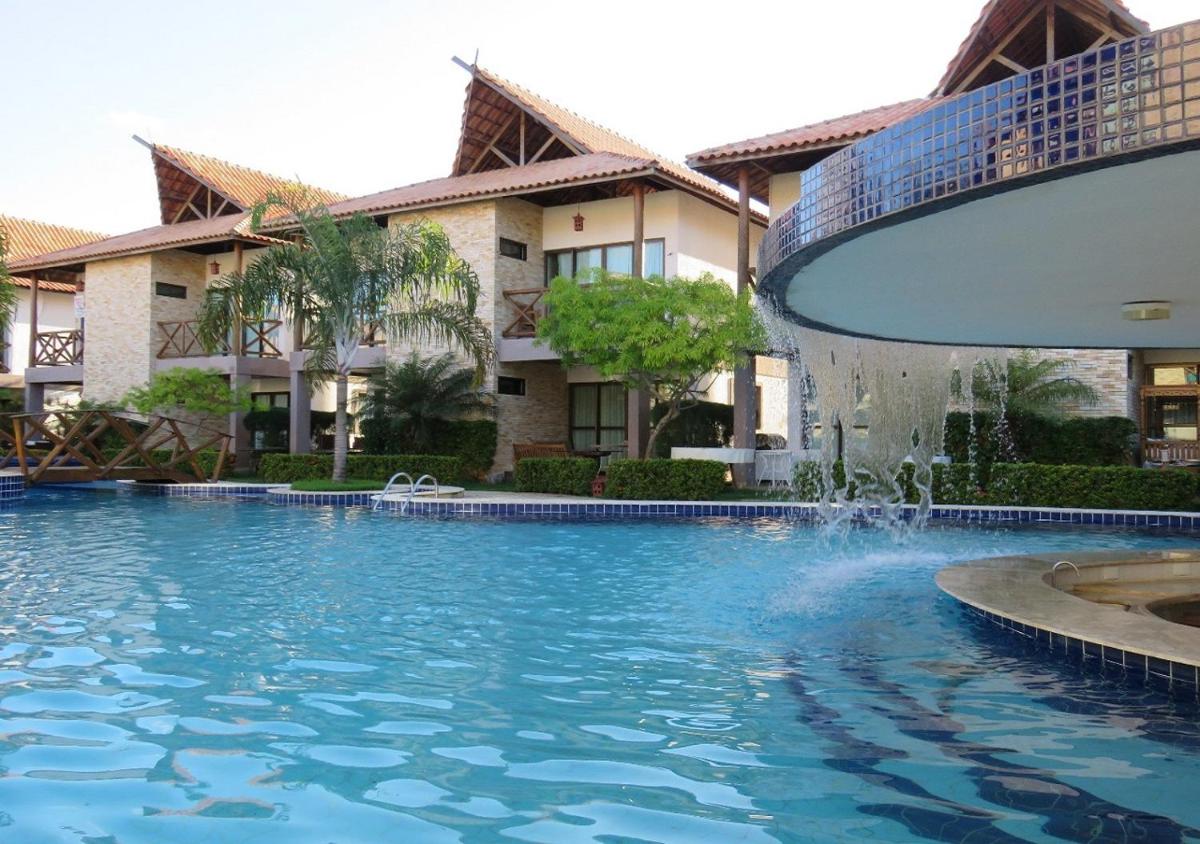 Bangalô com área de lazer estilo resort
