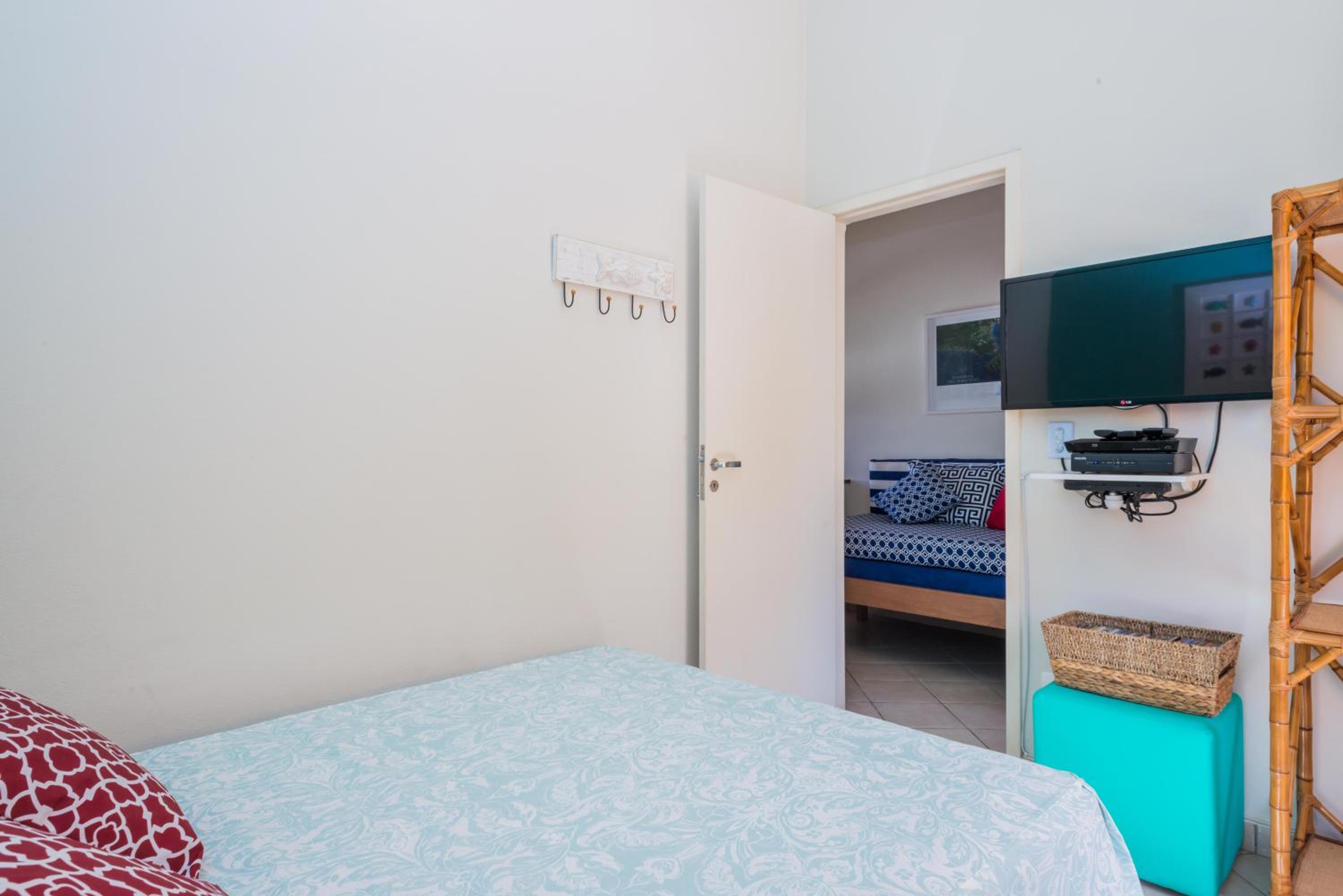 Novo Bhaus Juqueí - Churrasqueira Privativa - Piscina - 2 vagas - Condomínio com 8 casas - 600m da Praia - não possui roupa de cama e banho