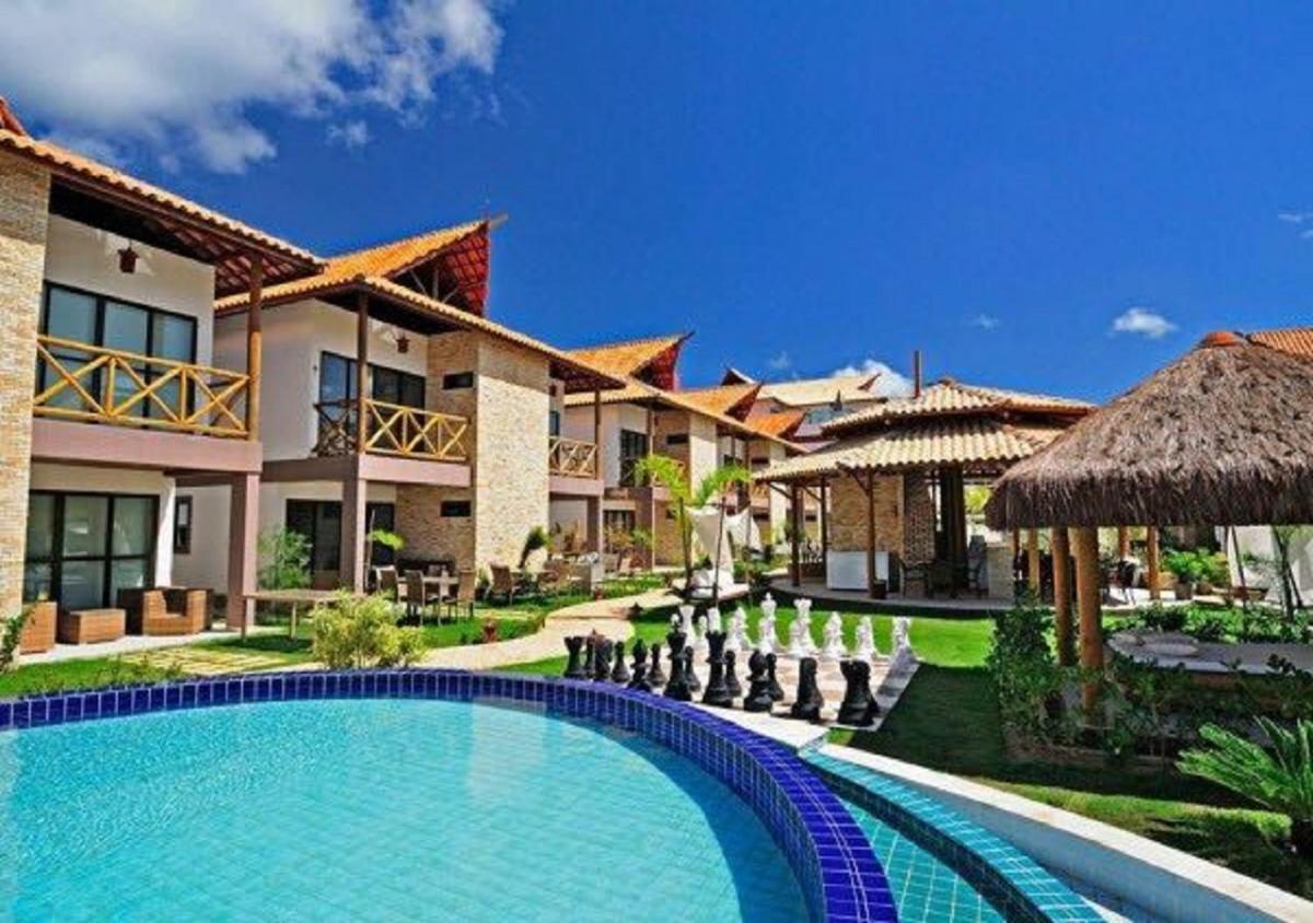 Bangalô com área de lazer estilo resort