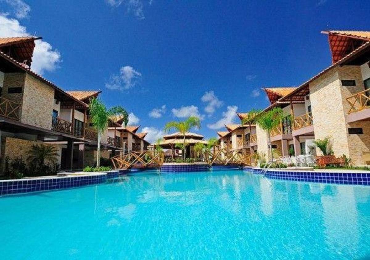 Bangalô com área de lazer estilo resort