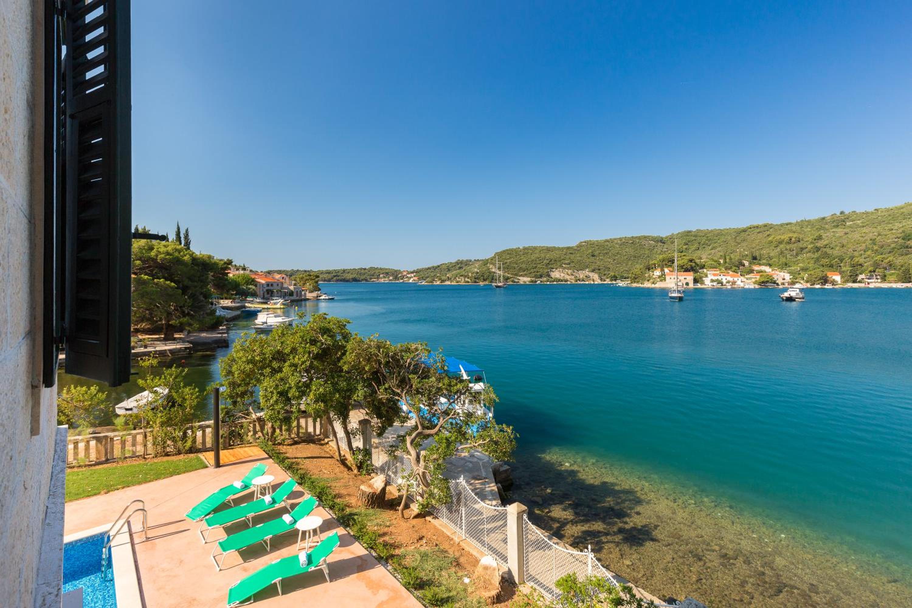 Villa Dubravka - heated outdoor pool and indoor jacuzzi view 5