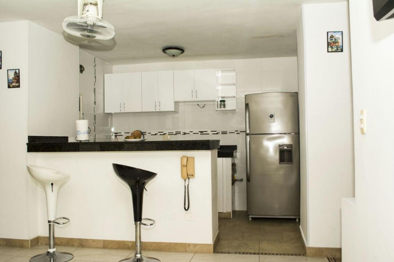 Apartamento con playa privada y piscina