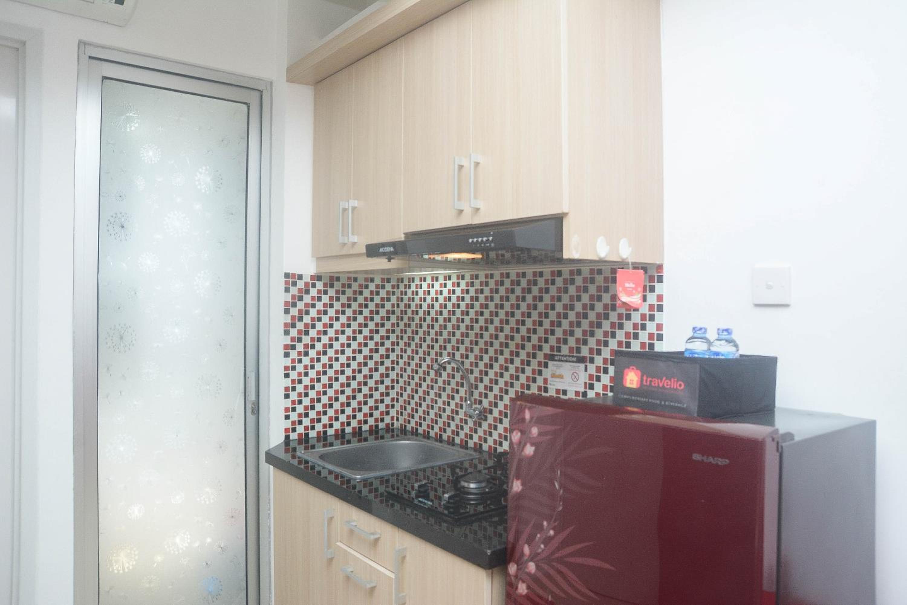 Cozy and Nice 1BR Bassura City Apartment By Travelio