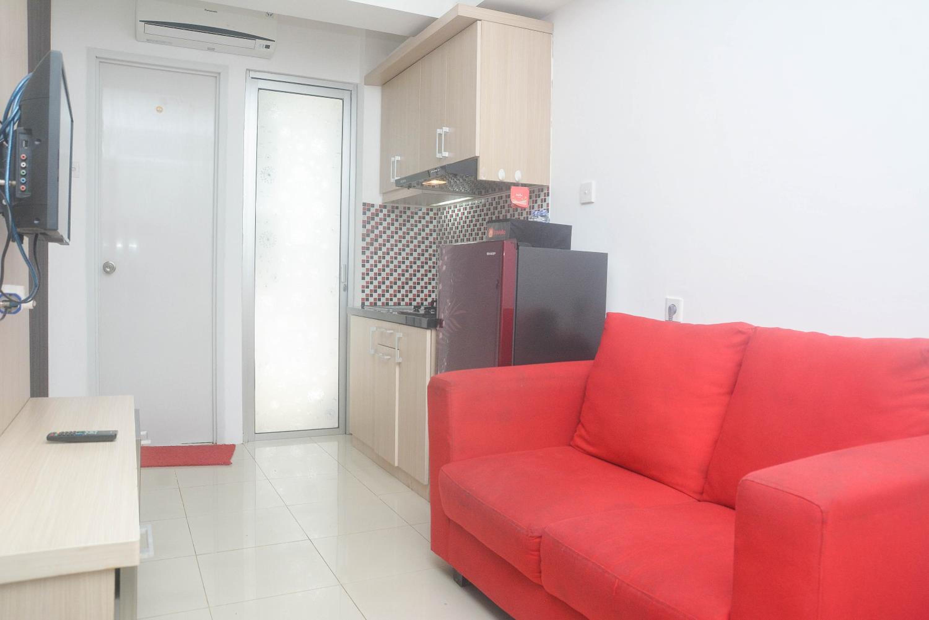 Cozy and Nice 1BR Bassura City Apartment By Travelio
