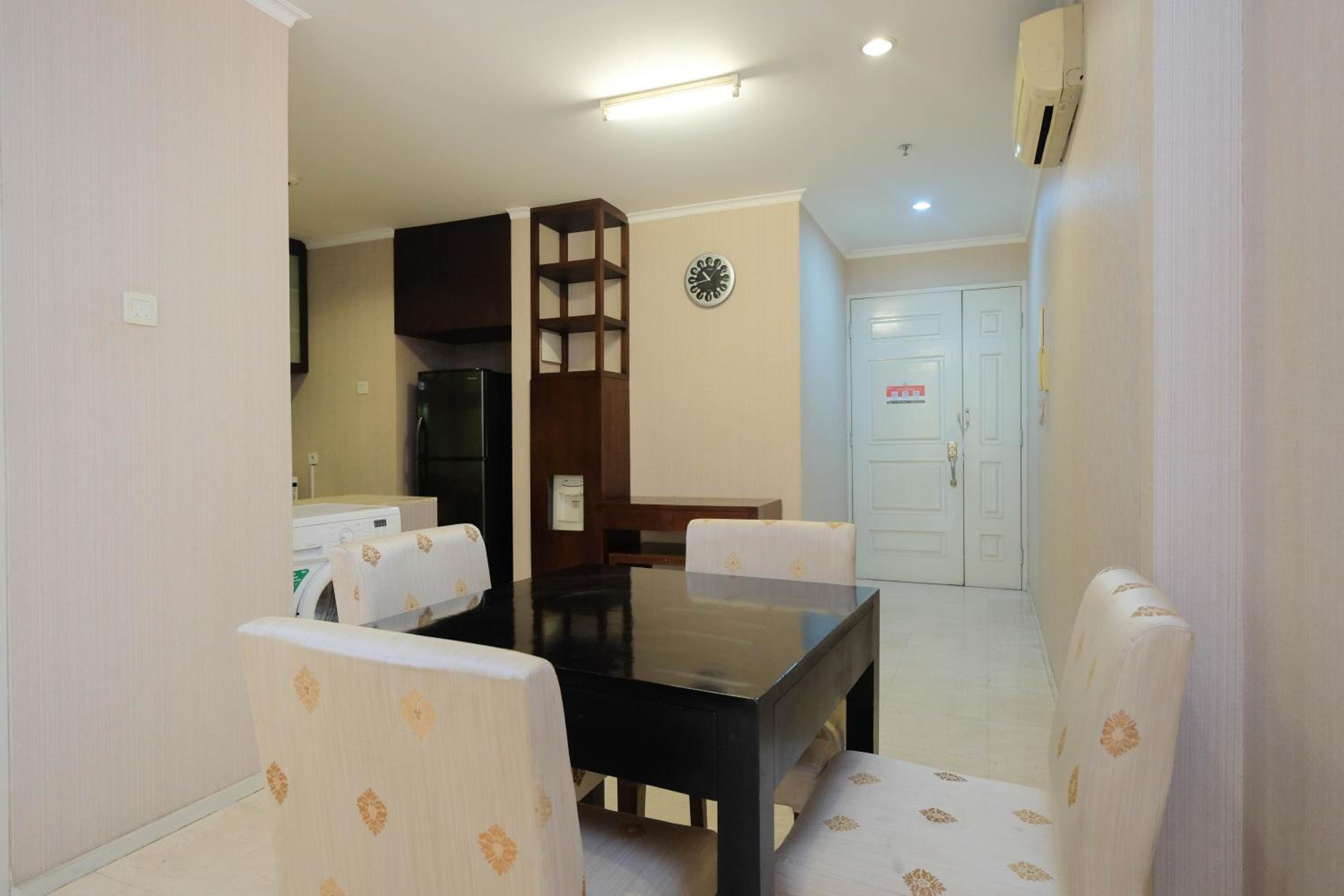 Nice and Homey 2BR Apartment at FX Residence By Travelio