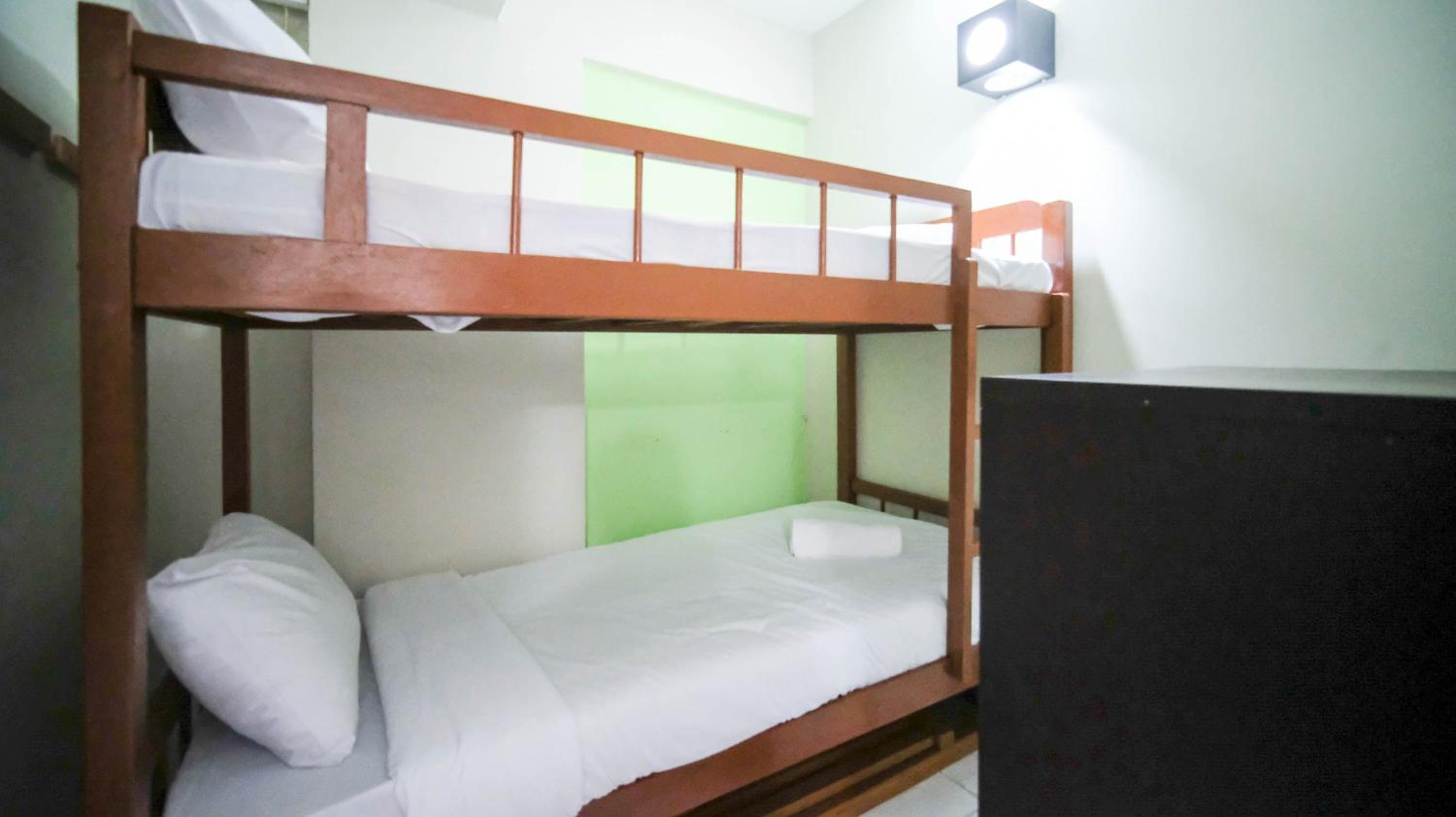 Homey and Comfy 2BR at Dian Regency Apartment By Travelio