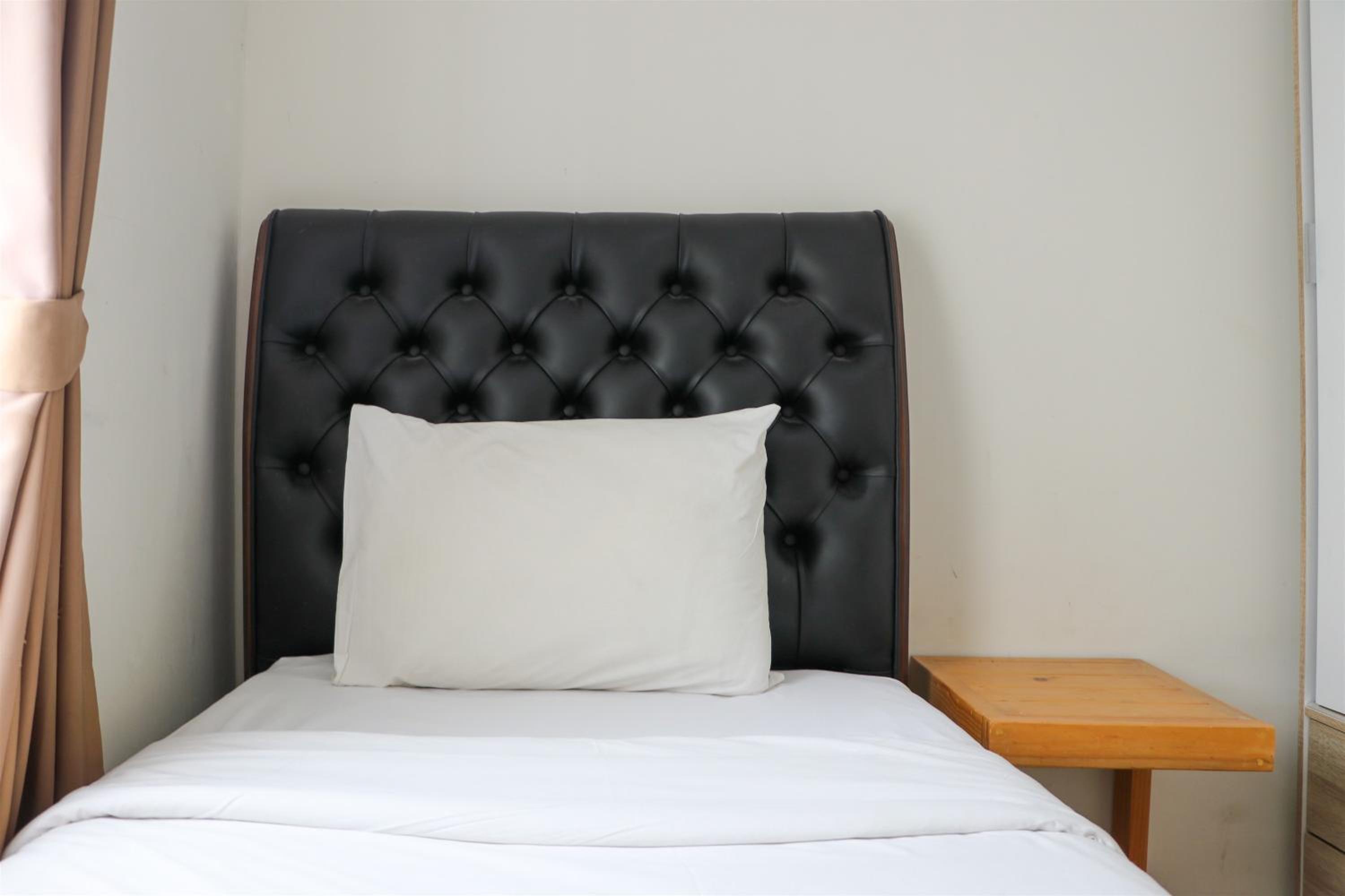 Tranquil Designed and Homey 2BR at Springlake Summarecon Bekasi Apartment By Travelio