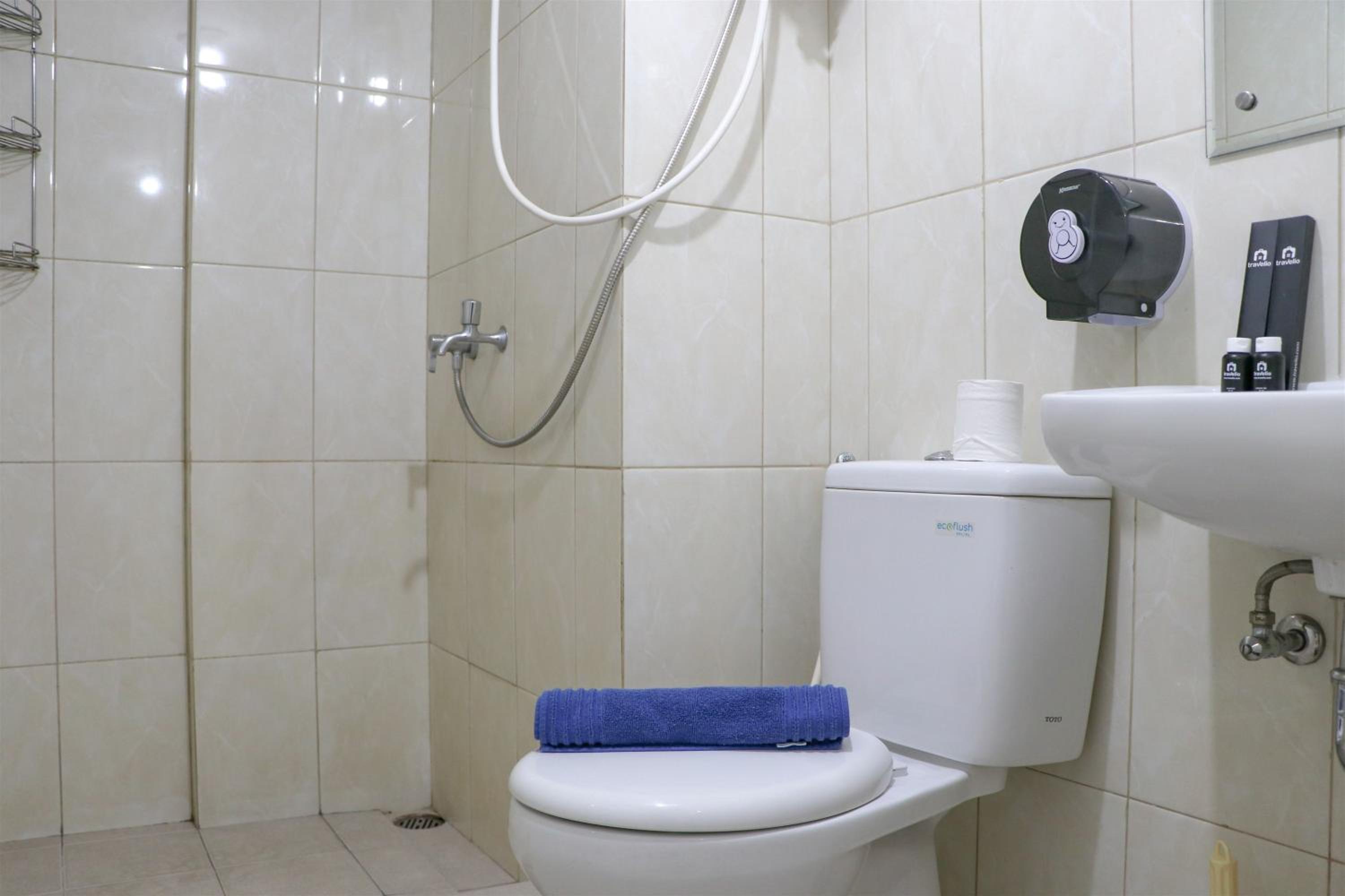 Tranquil Designed and Homey 2BR at Springlake Summarecon Bekasi Apartment By Travelio