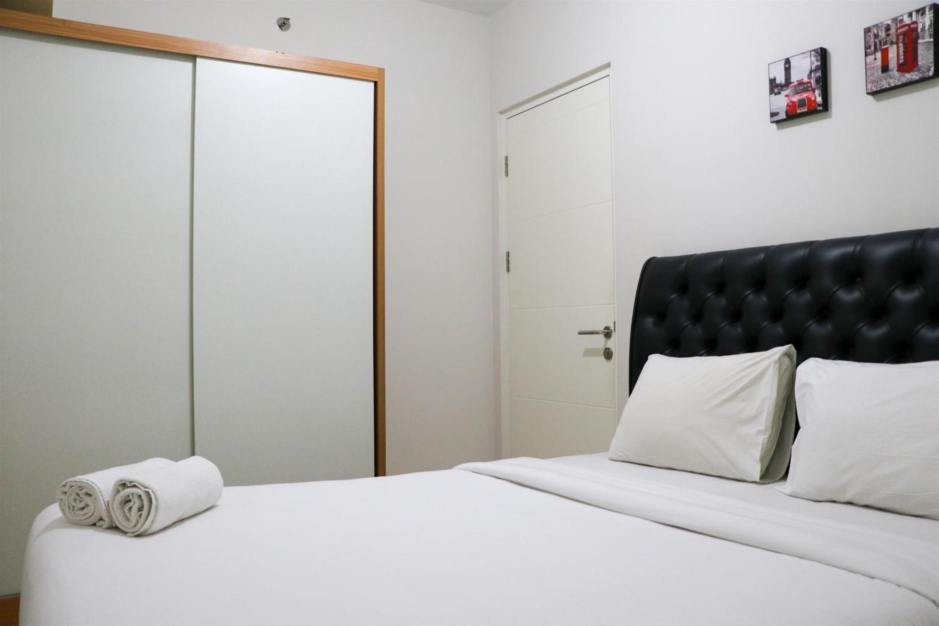 Tranquil Designed and Homey 2BR at Springlake Summarecon Bekasi Apartment By Travelio