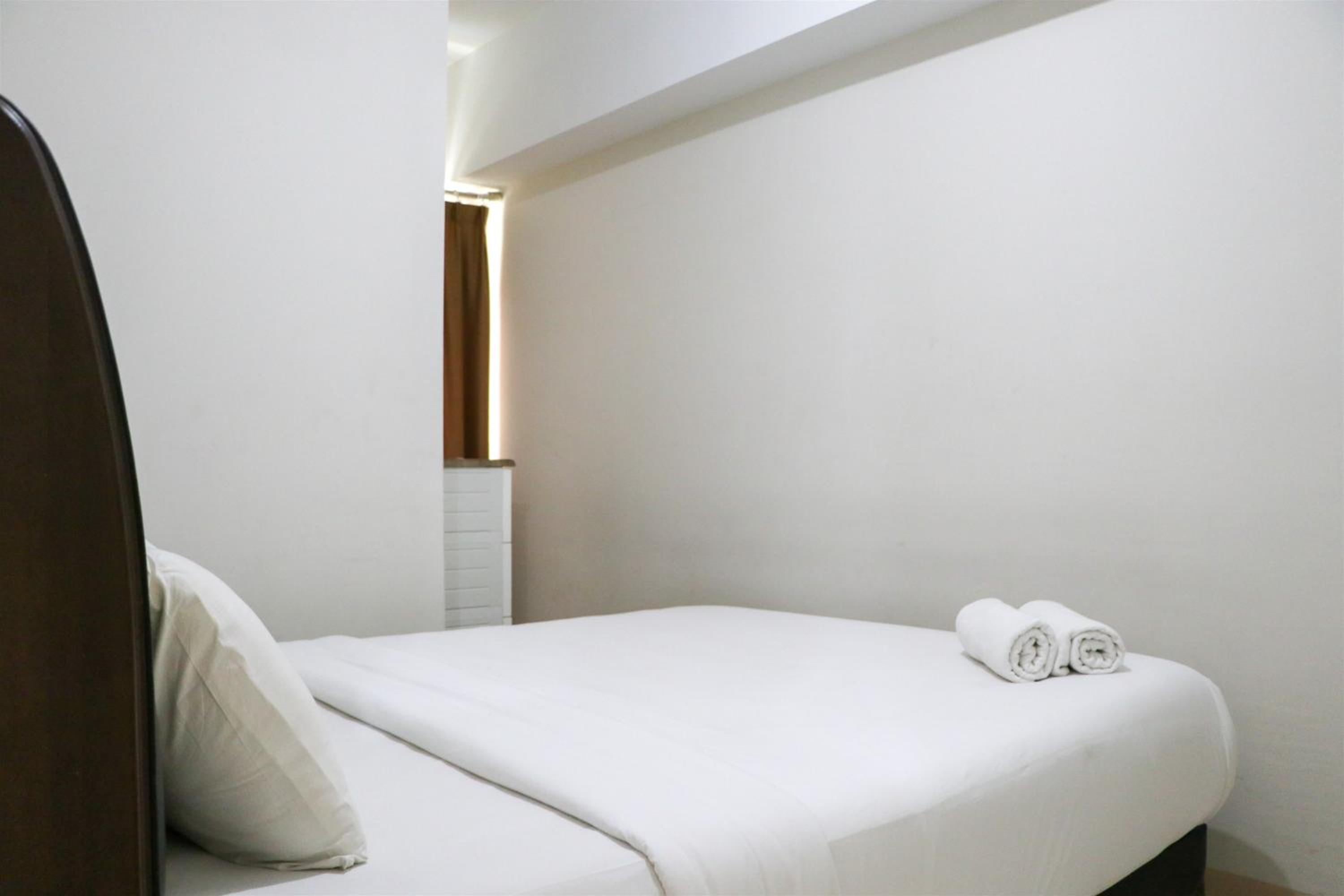 Tranquil Designed and Homey 2BR at Springlake Summarecon Bekasi Apartment By Travelio