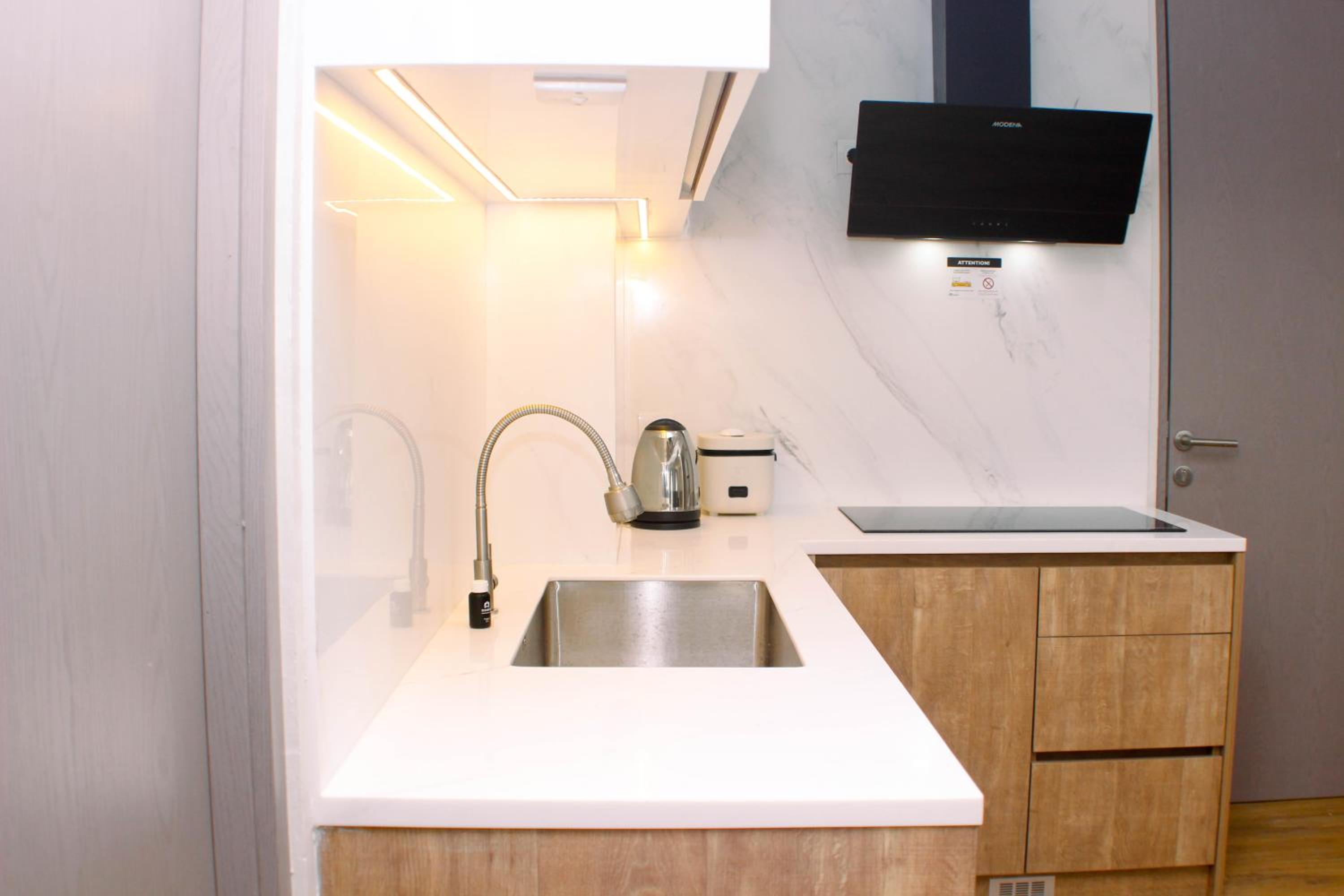 1BR Spacious Combine Unit at Vasanta Innopark Apartment By Travelio