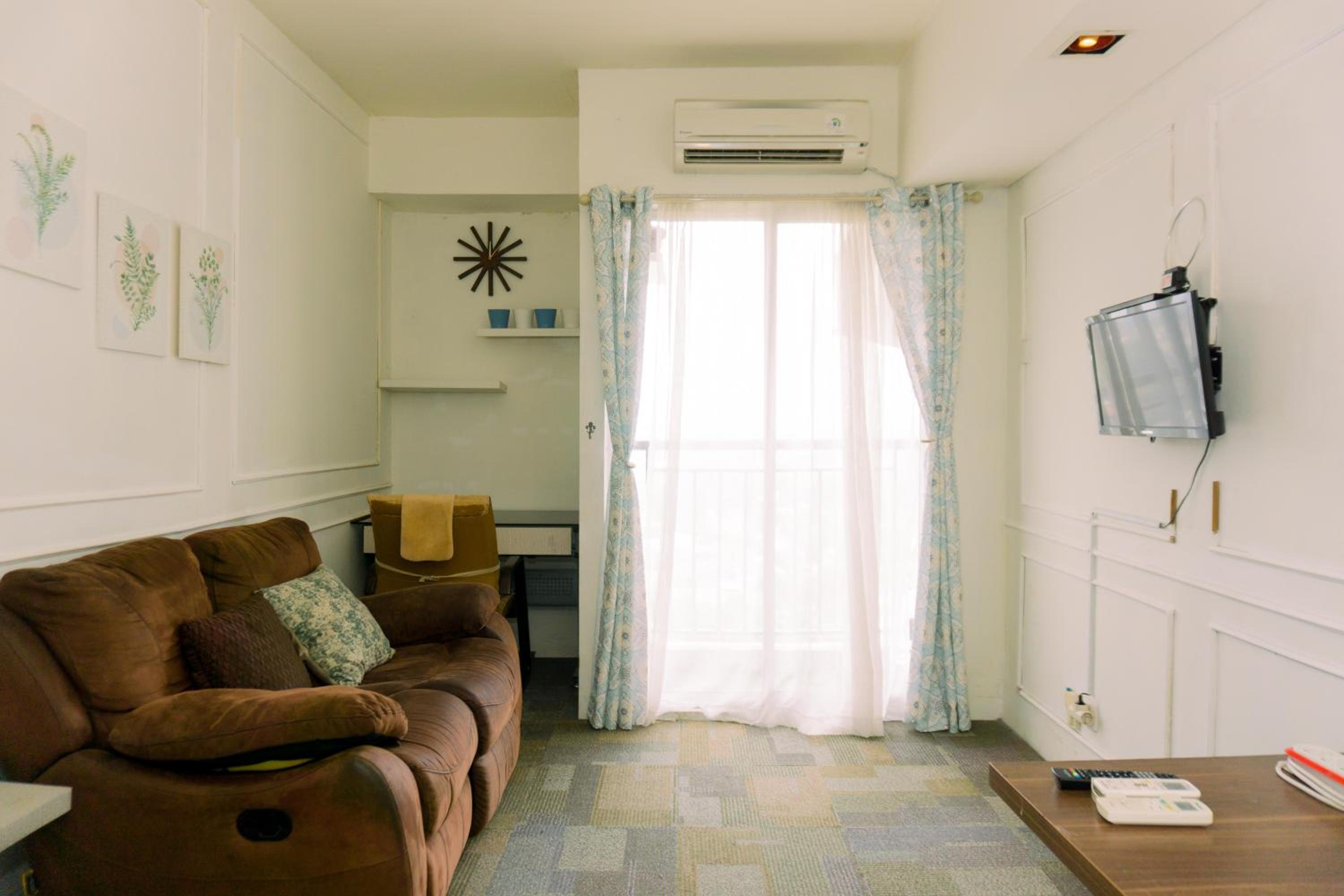 Nice and Homey 1BR at Serpong Greenview Apartment By Travelio