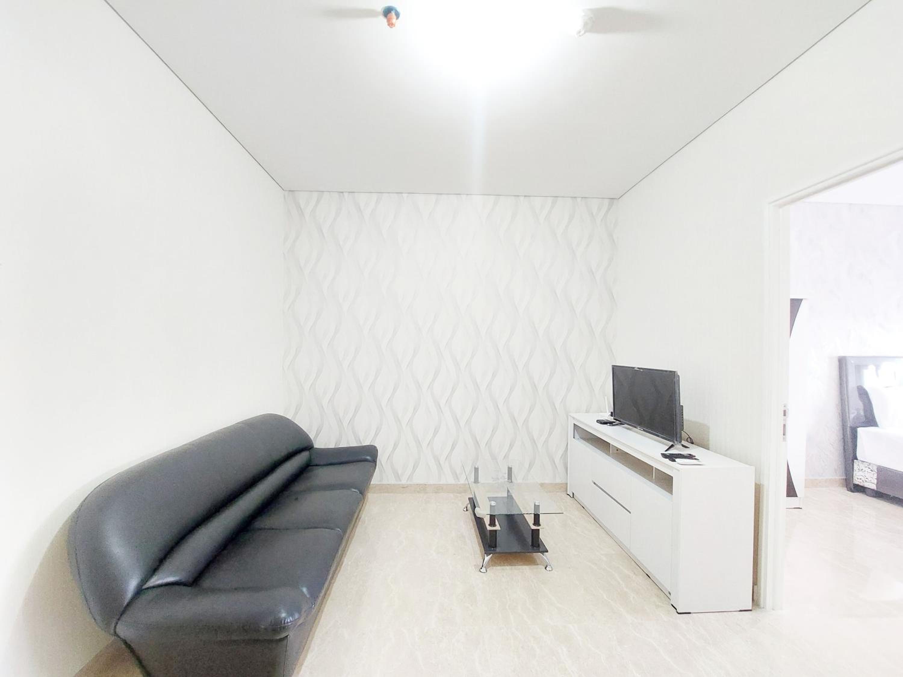Comfort Stay 1BR at Podomoro City Deli Medan Apartment By Travelio