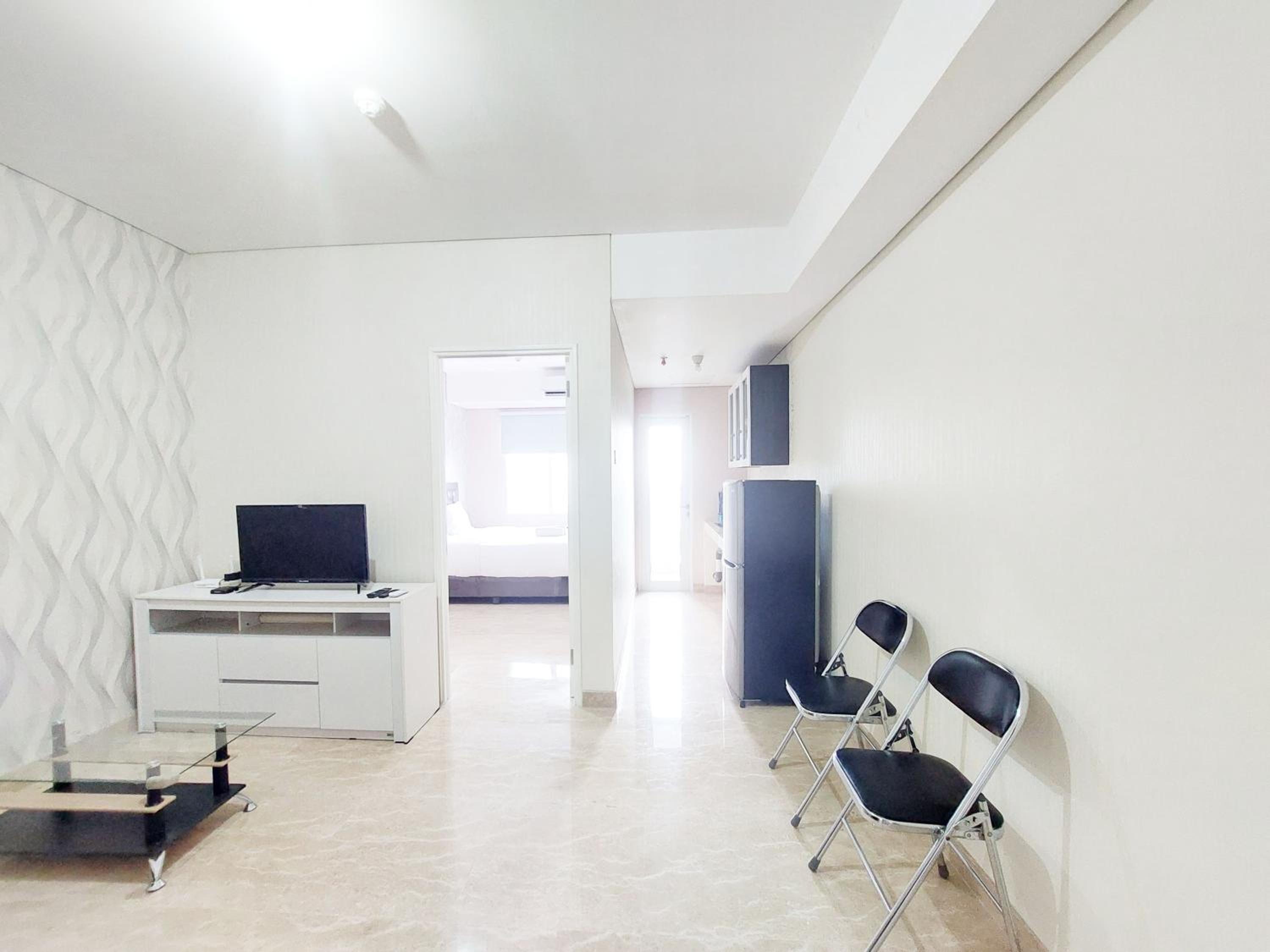Comfort Stay 1BR at Podomoro City Deli Medan Apartment By Travelio