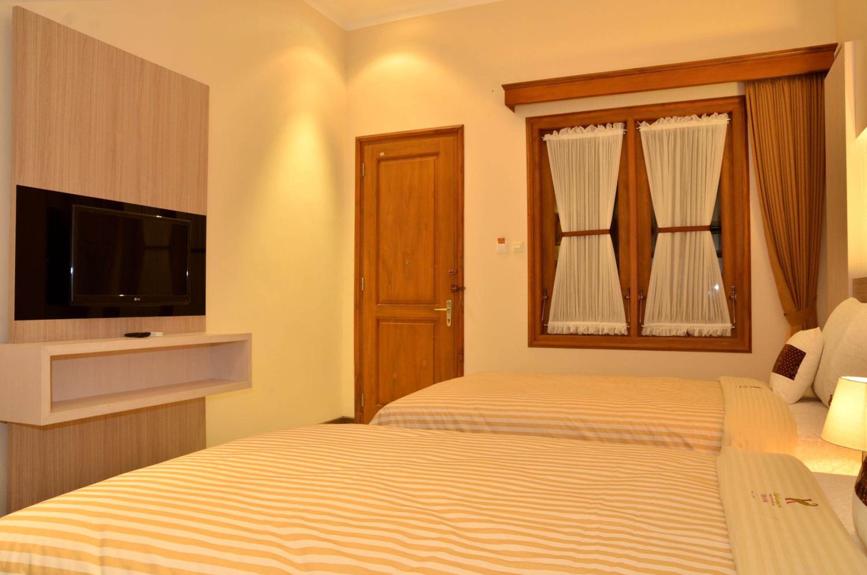 Kertanegara Premium Guest House