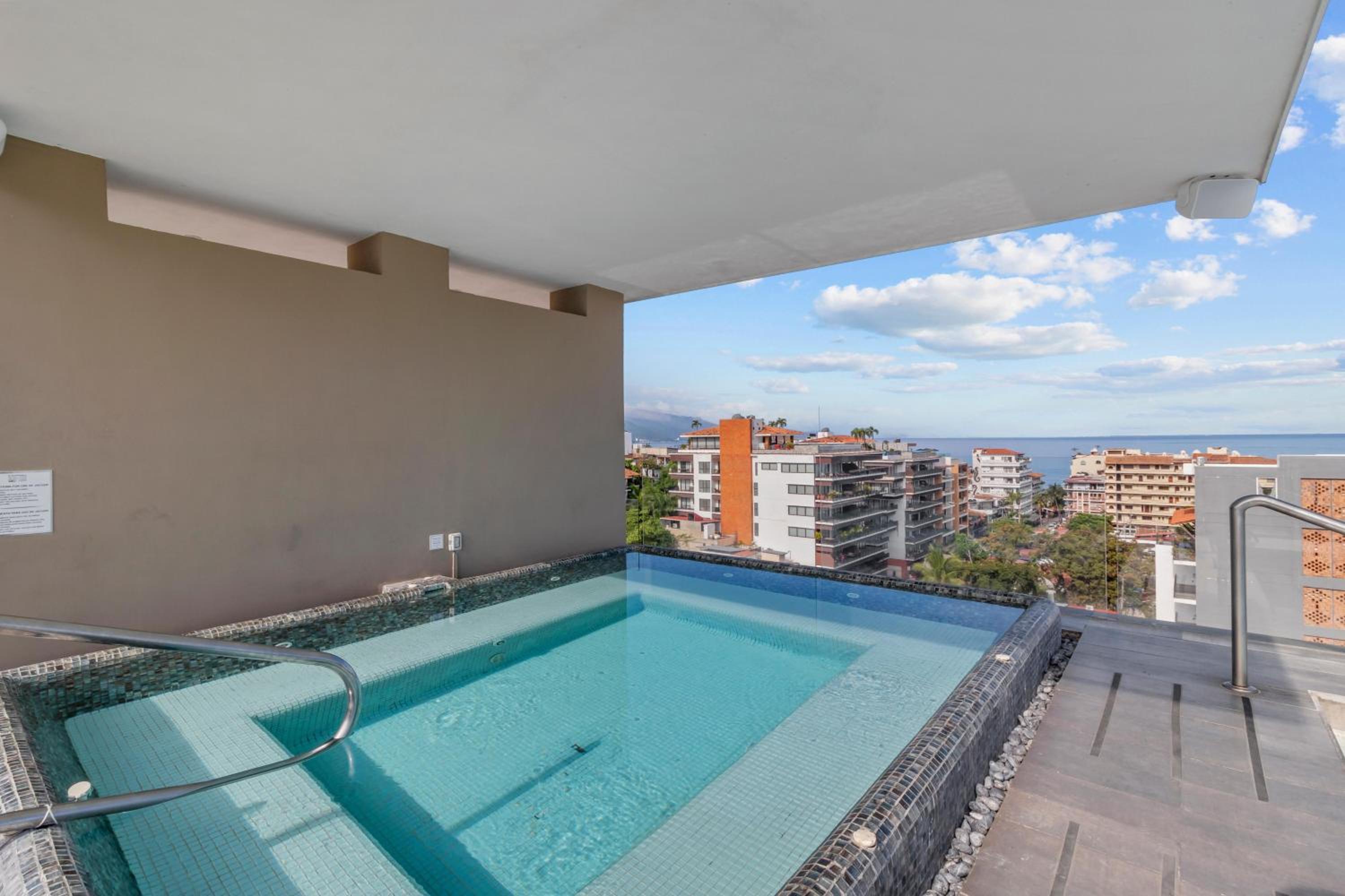 Dedicated workspace, Pool, Gym | Romantic Zone 2BR