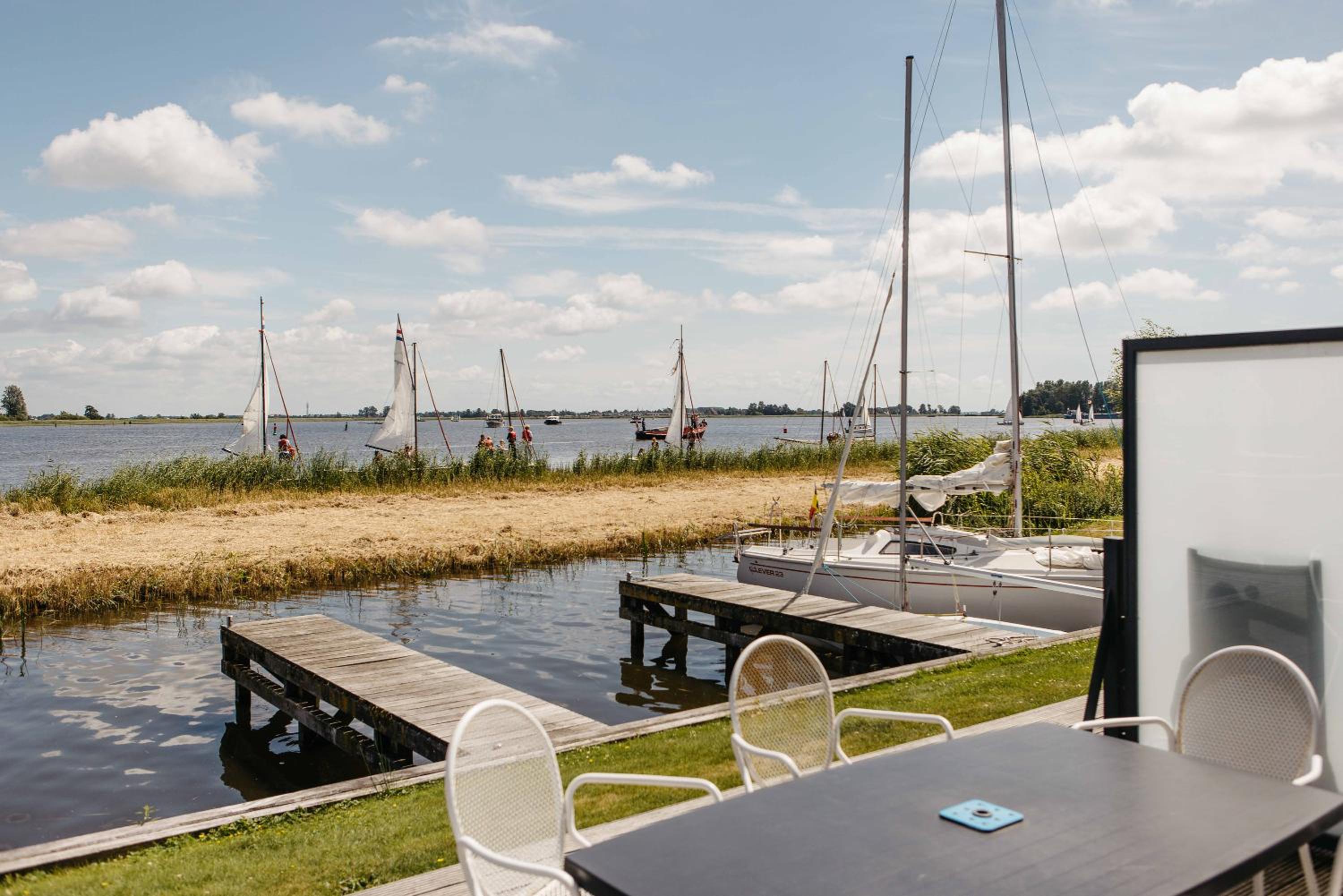 Luxury Townhouses in Heeg (6 & 8 Guests) with Roof Terrace, Views & Private Dock on the Heegermeer