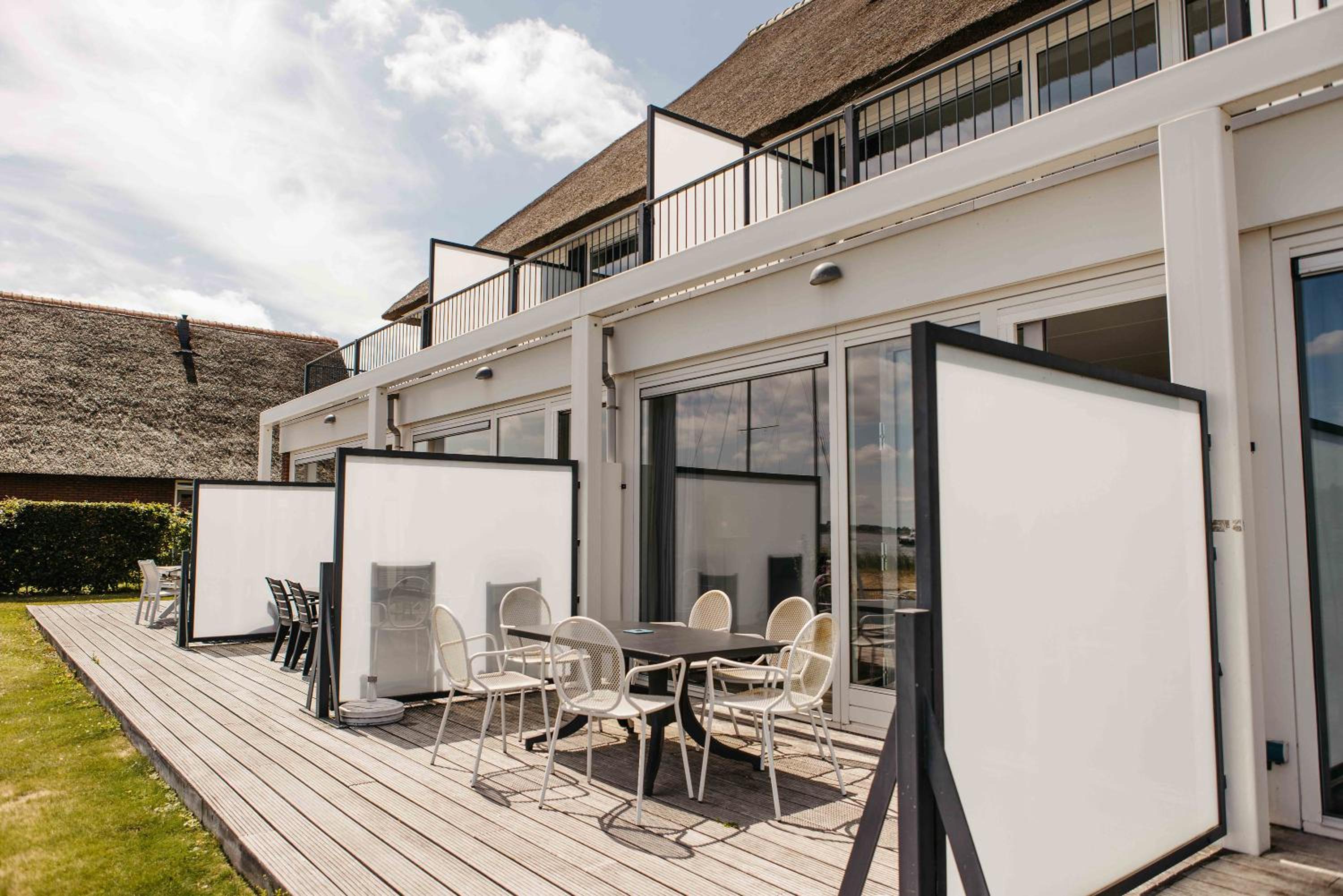 Luxury Townhouses in Heeg (6 & 8 Guests) with Roof Terrace, Views & Private Dock on the Heegermeer