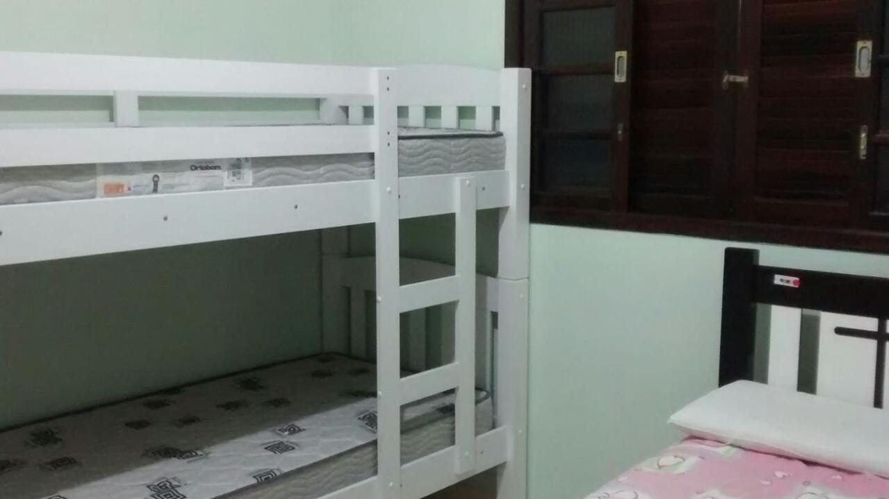 Casa Gomes com 3 suítes e ar-condicionado até 12 pessoas em Ubatuba Itaguá