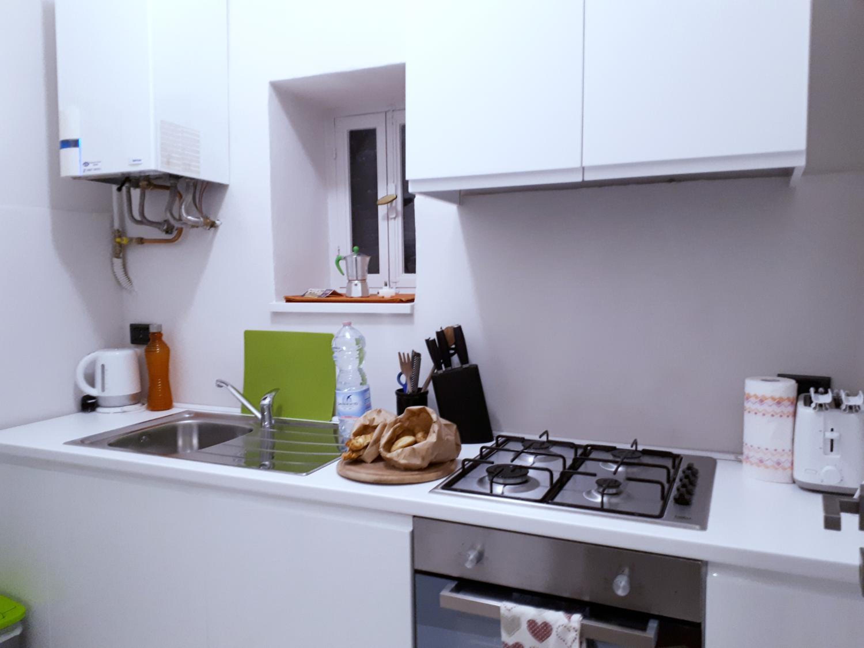 Toselli Suite Apartment en Pisa — kitchen
