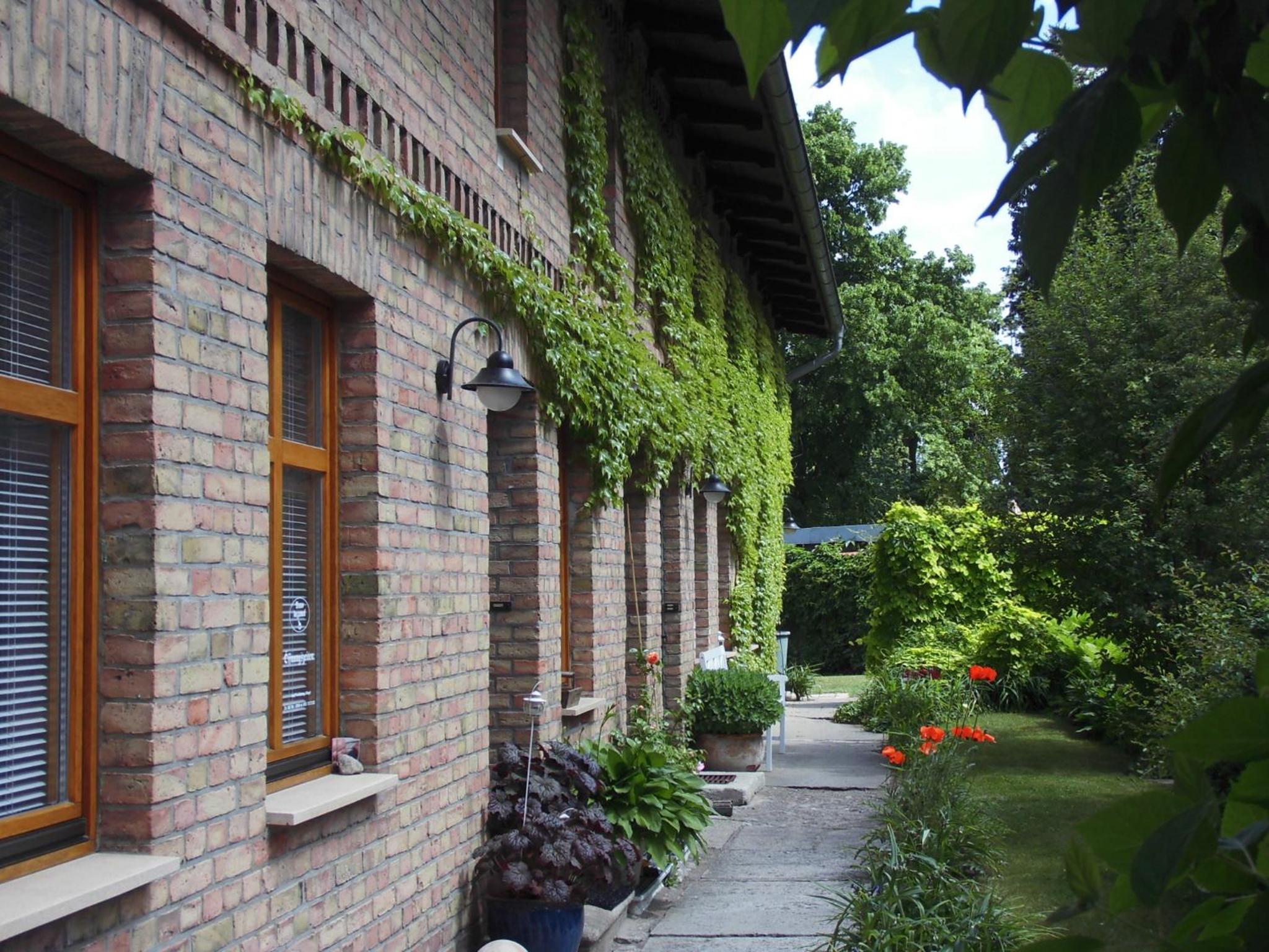 SchlossparkFerienwohnungen Rheinsberg mit Garten