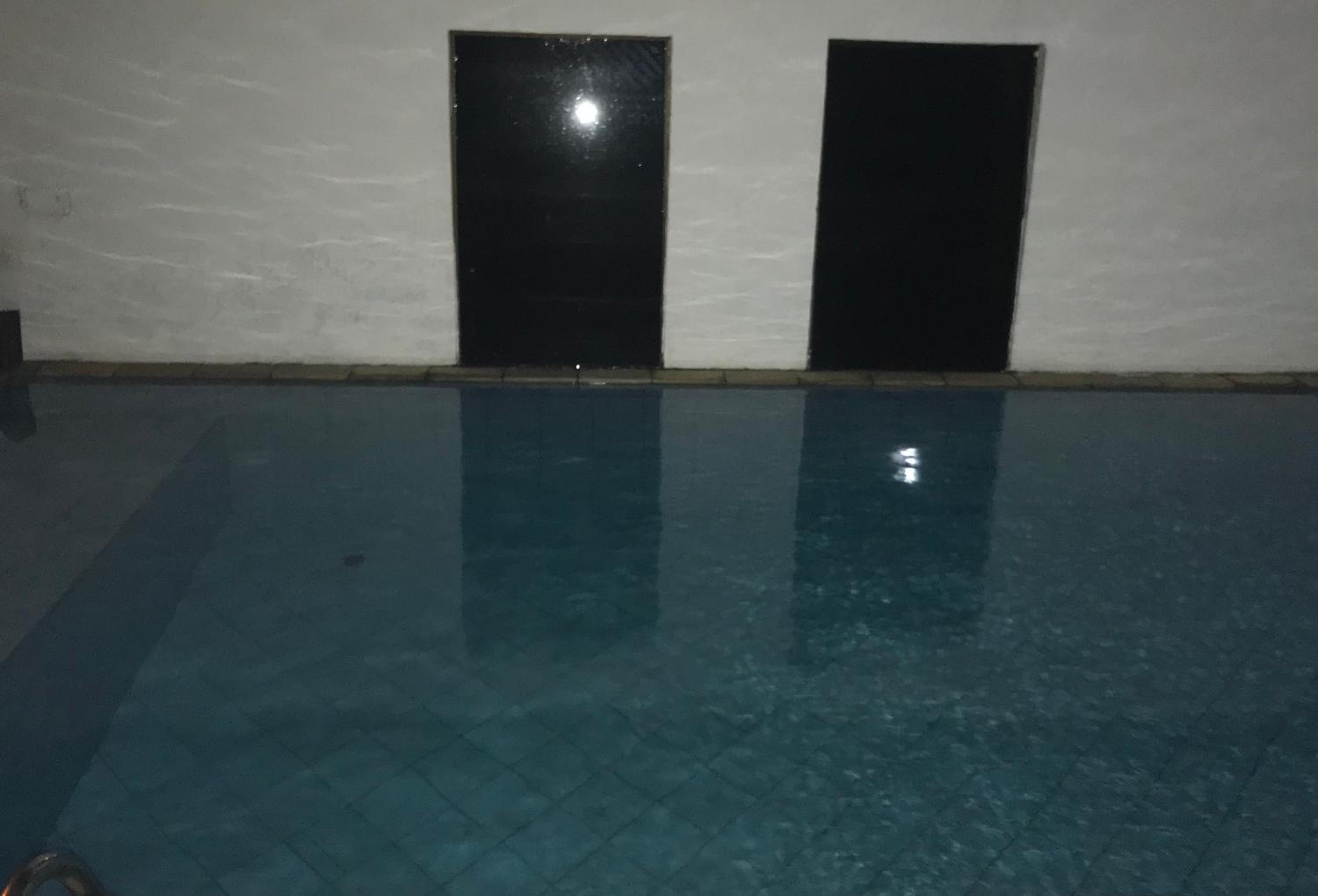 No Centro com Piscina Aquecida solar