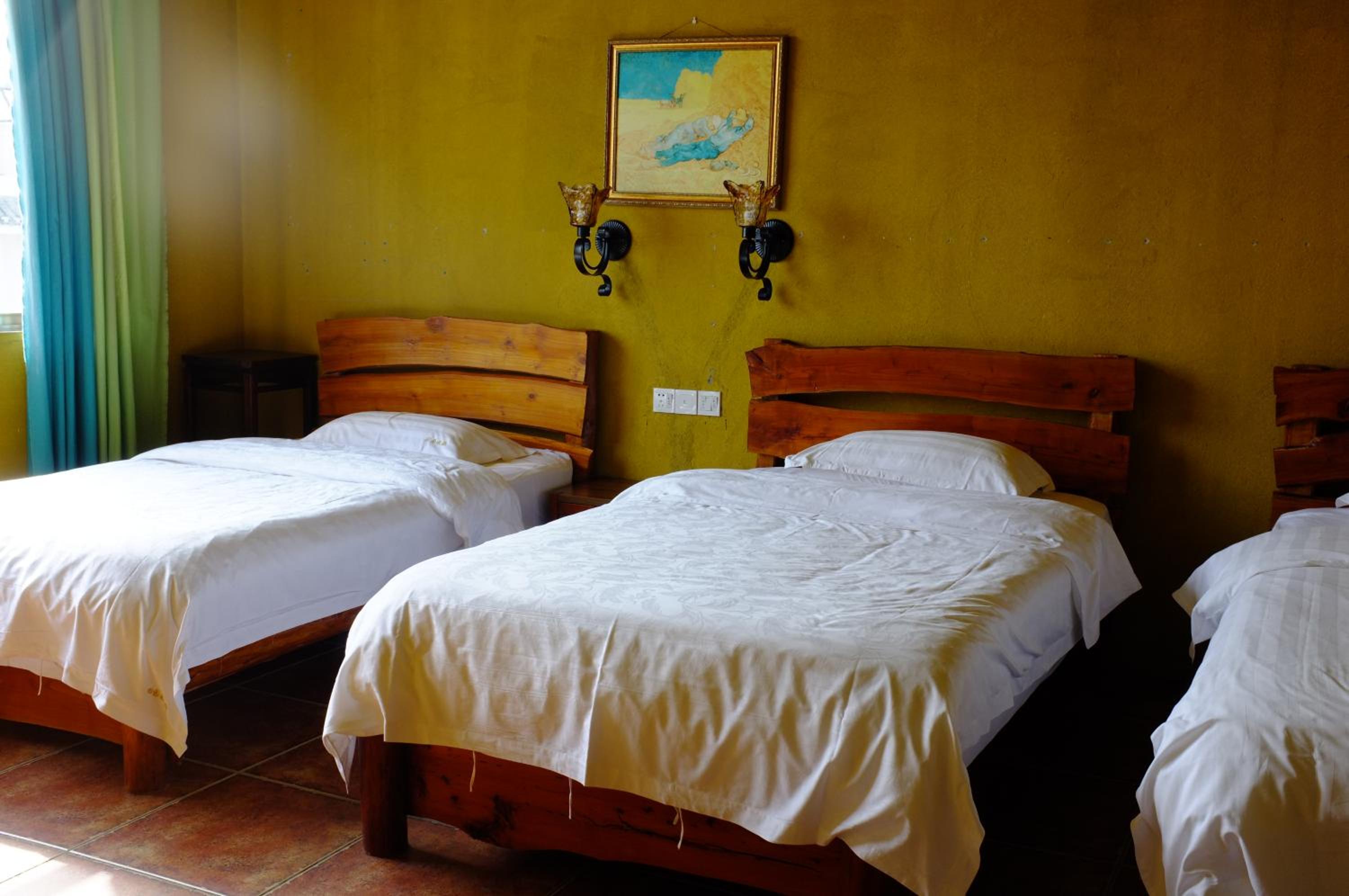 Yangshuo Eden's Social Guesthouse - Wake up to a hearty Western breakfast & fresh craft coffee & night beers & outdoor activities