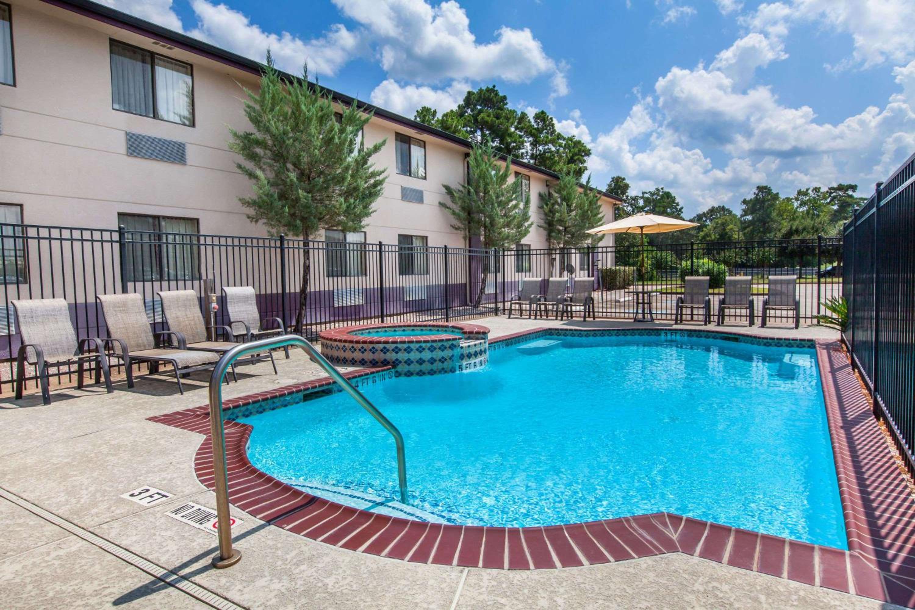 Super 8 by Wyndham Cleveland TX view 4