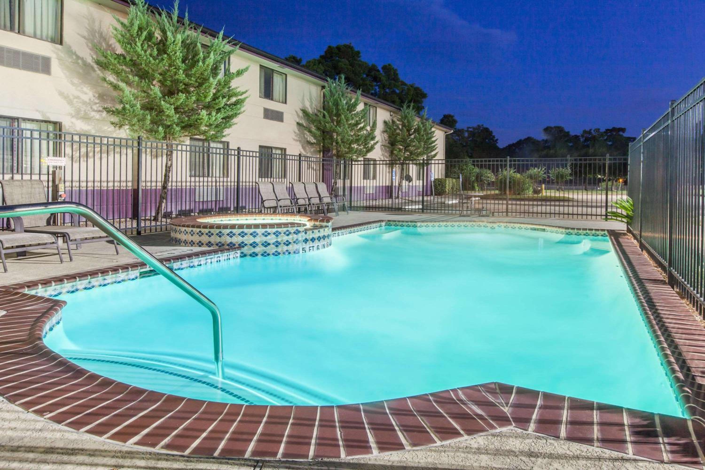 Super 8 by Wyndham Cleveland TX view 5