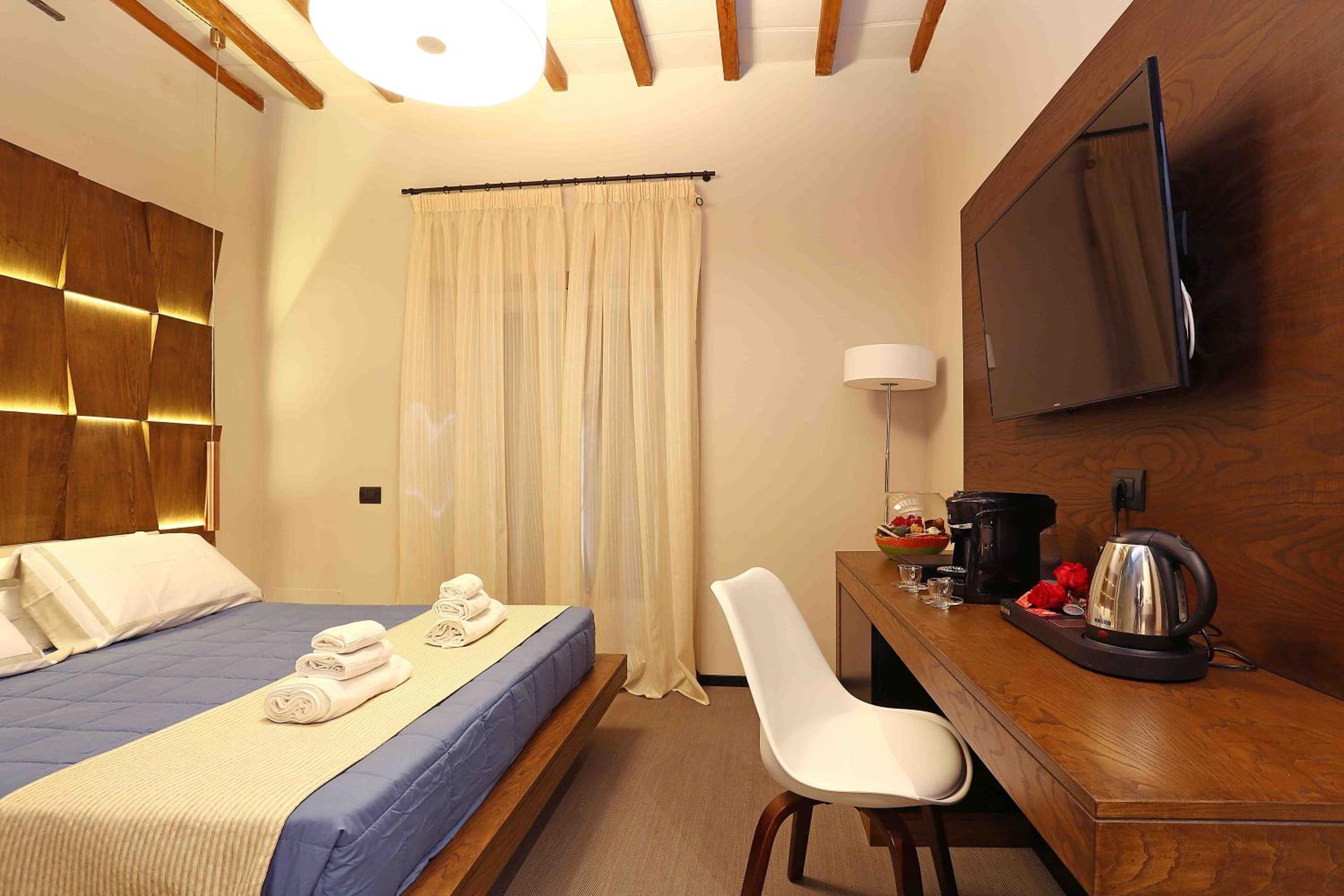 Unicum Vite en Rome — hotel room