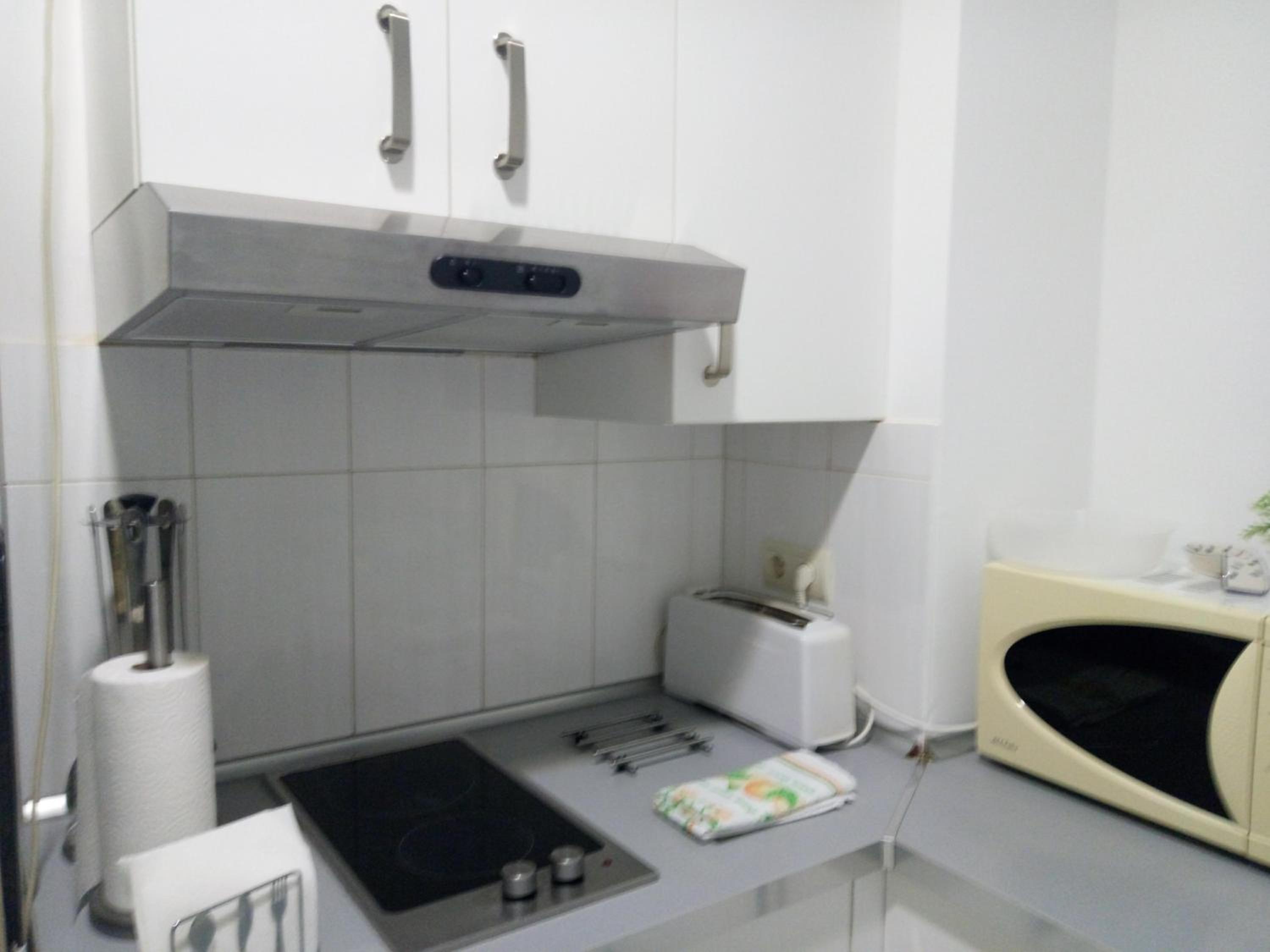 Alfaqueque Apartment en Seville — kitchen