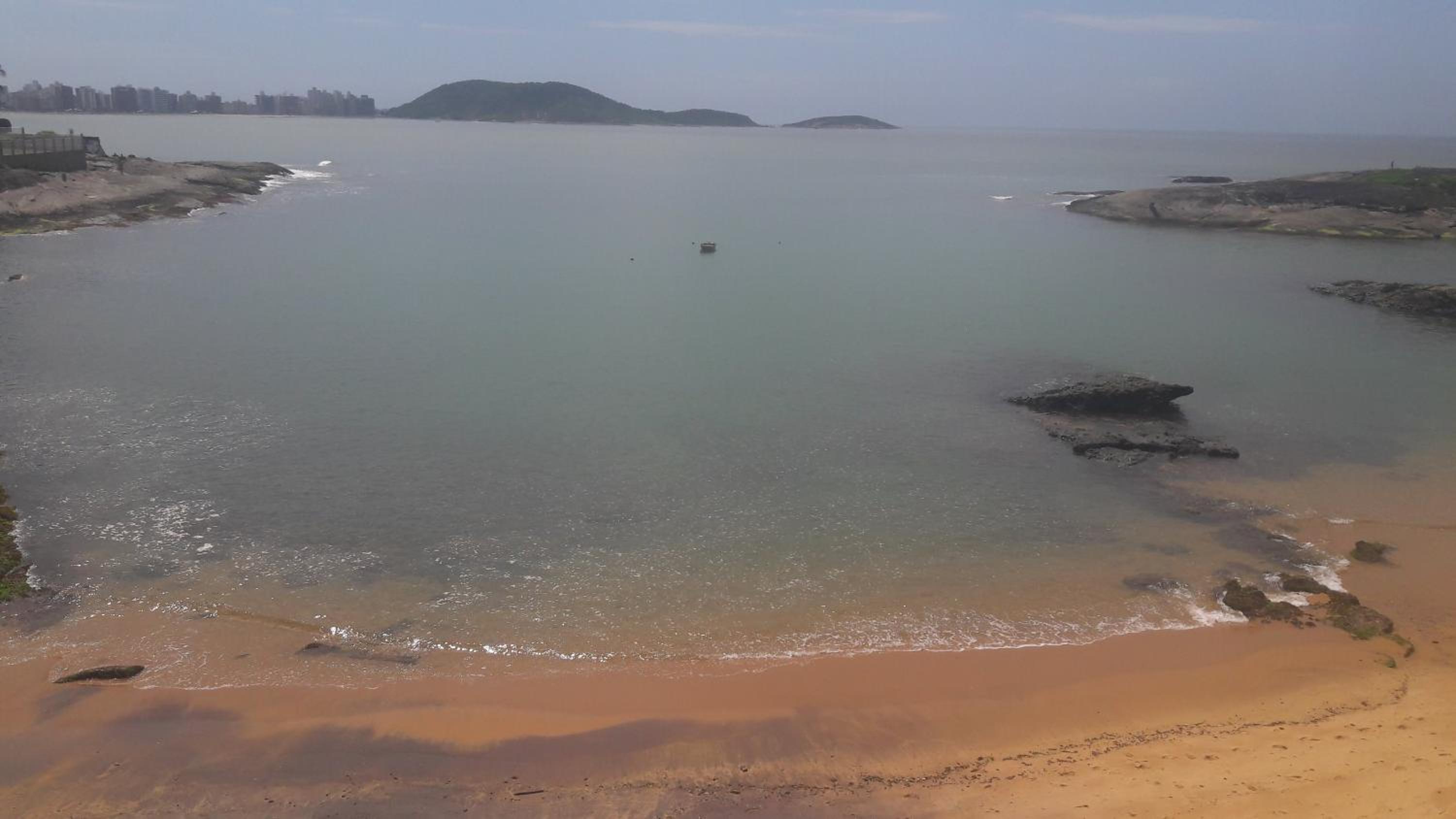 Apartamento Guarapari pé na areia com Wi-Fi e Garagem