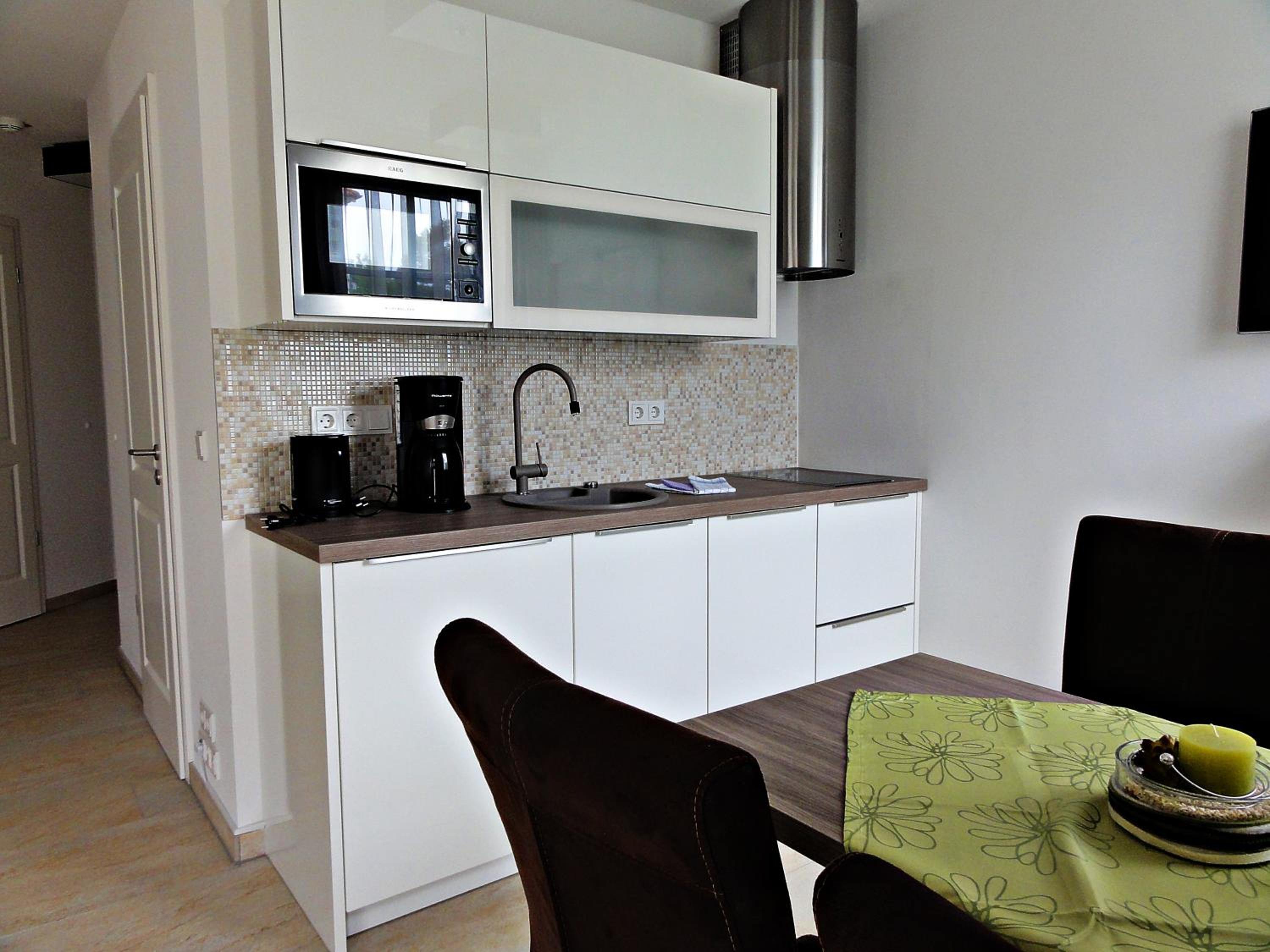 3 Zimmer Ferienwohnung Haus Meeresblick mit Meerblick A005 mit Südterrasse und Strandkorb