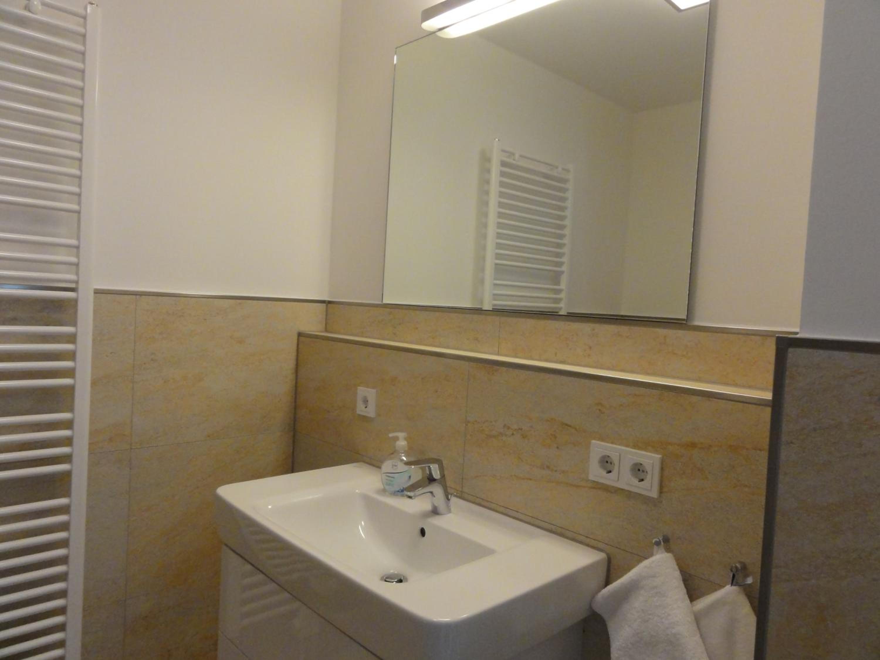 3 Zimmer Ferienwohnung Haus Meeresblick mit Meerblick A005 mit Südterrasse und Strandkorb