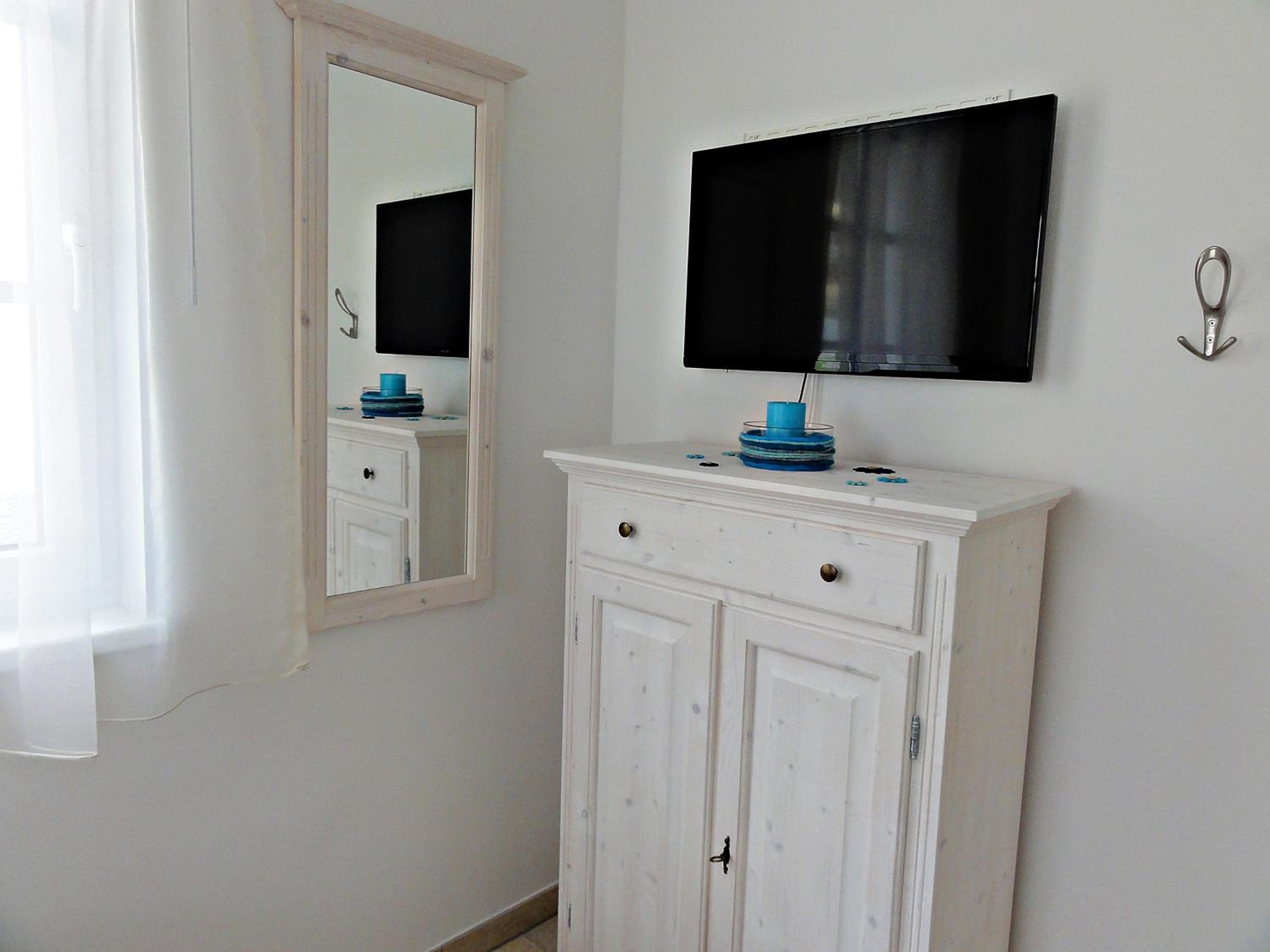 3 Zimmer Ferienwohnung Haus Meeresblick mit Meerblick A005 mit Südterrasse und Strandkorb