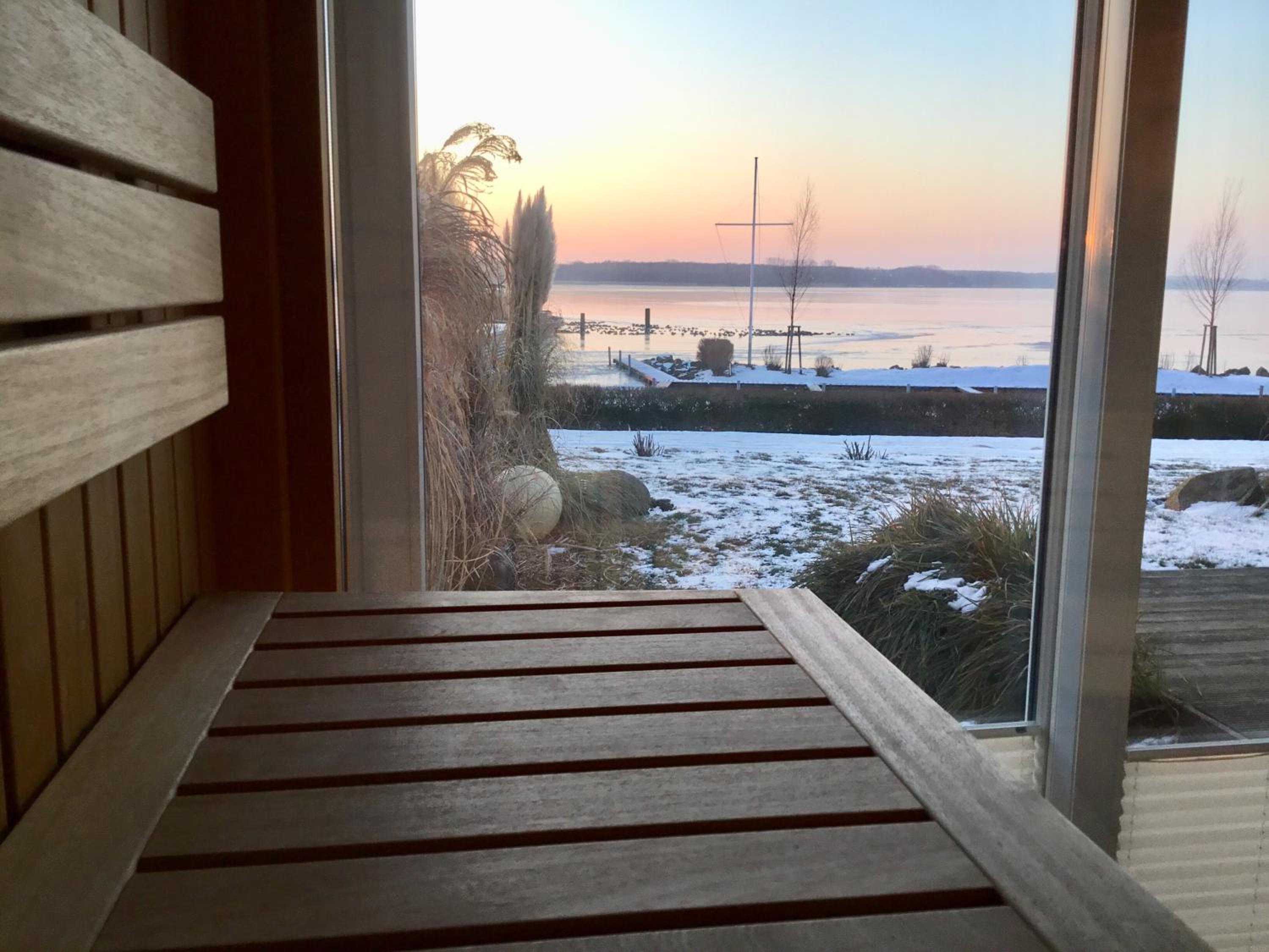Fischerhus mit Boot,Sauna und Kamin je Seite