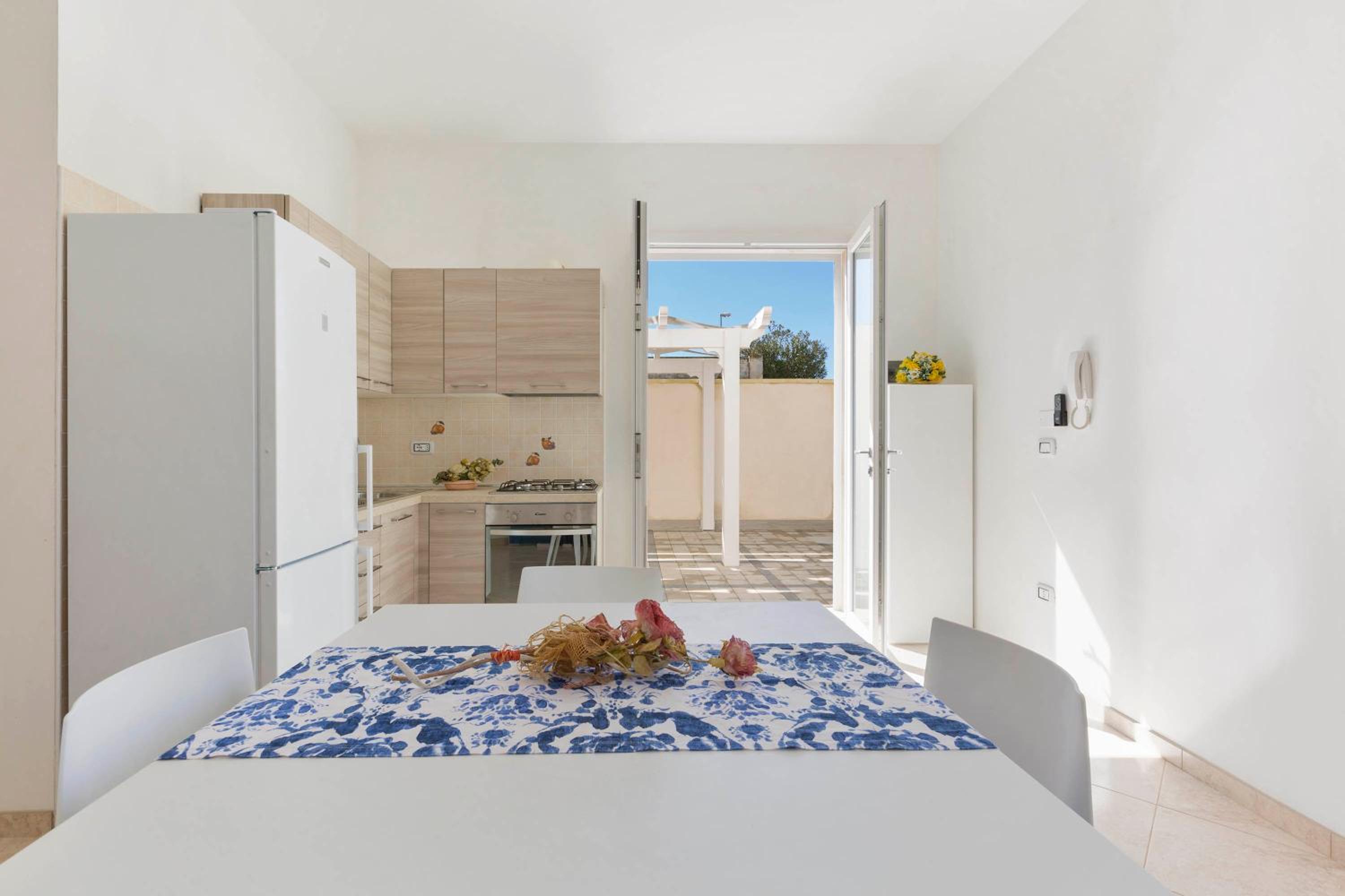 Residence Pianeta Mare en Torre Lapillo — kitchen