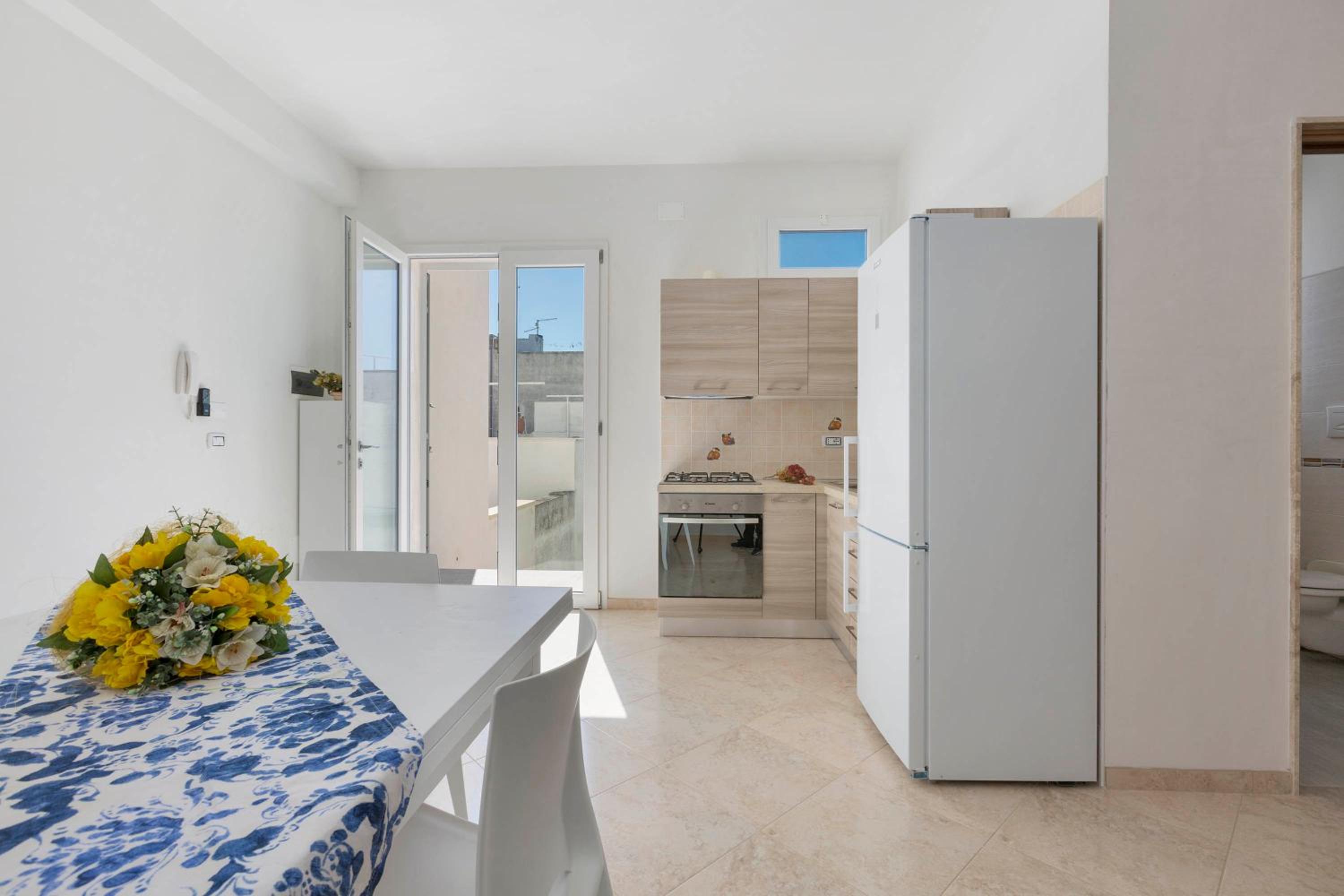Residence Pianeta Mare en Torre Lapillo — kitchen