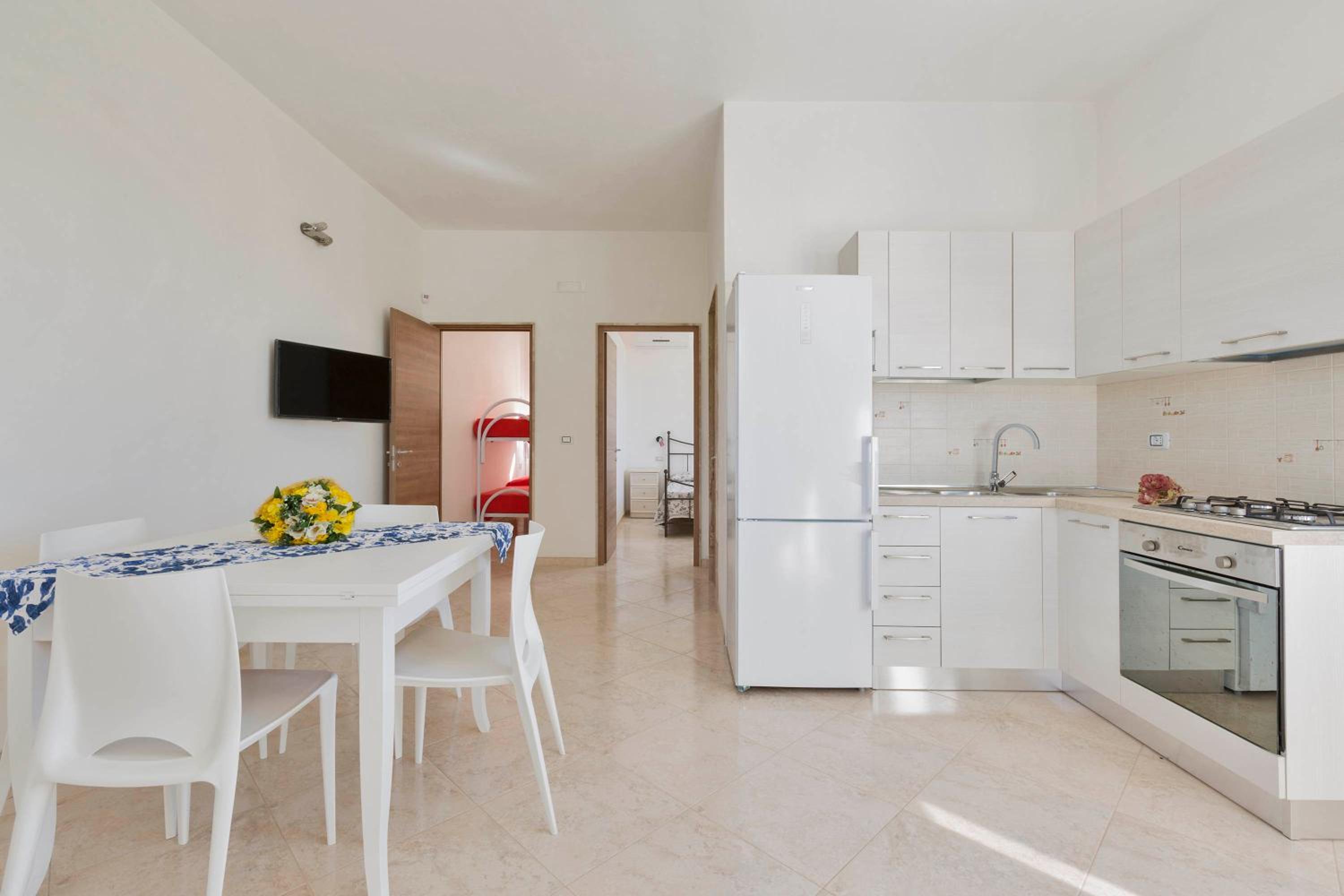 Residence Pianeta Mare en Torre Lapillo — kitchen
