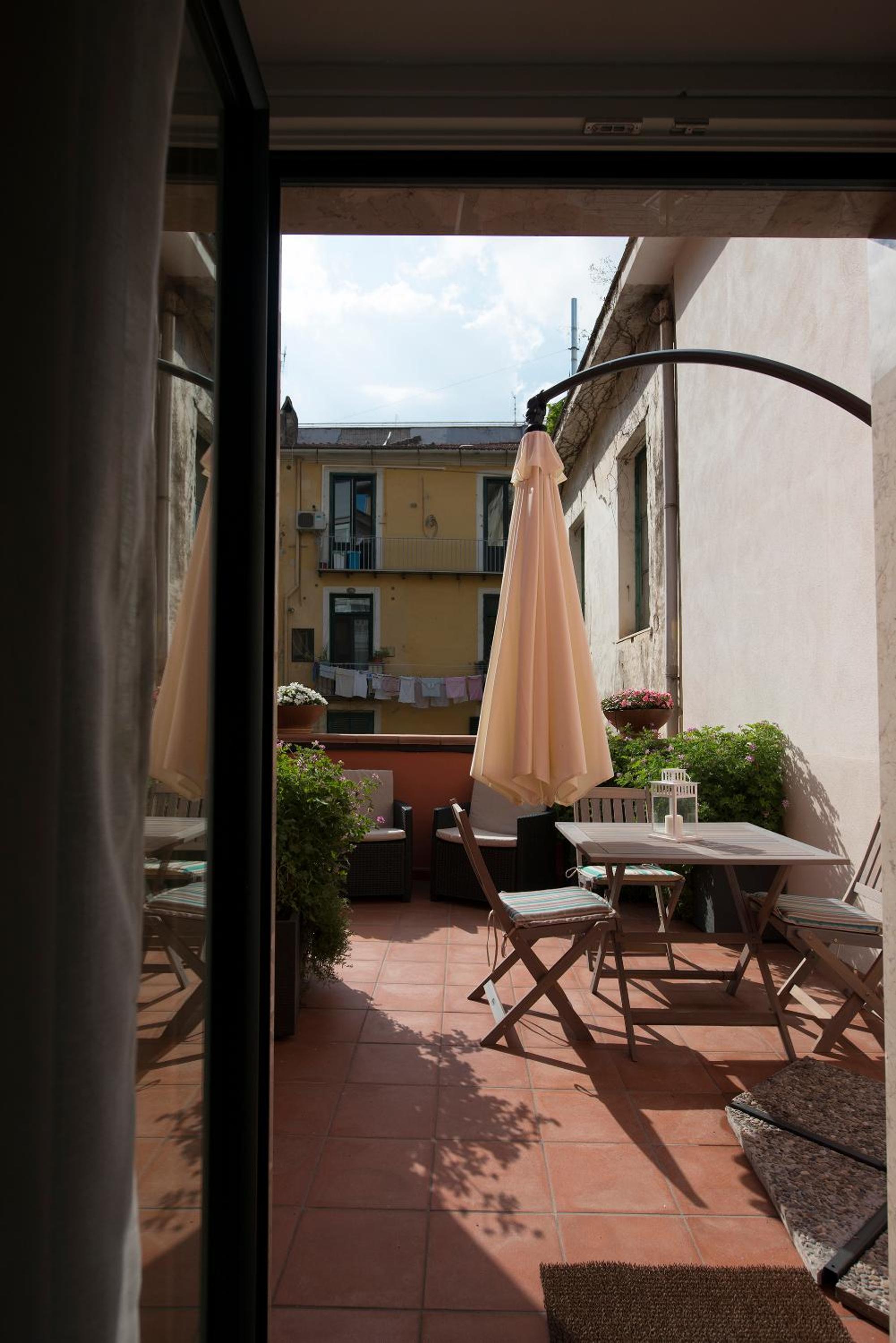 Le Terrazze sul Cortile - Amami Viaggi Collection