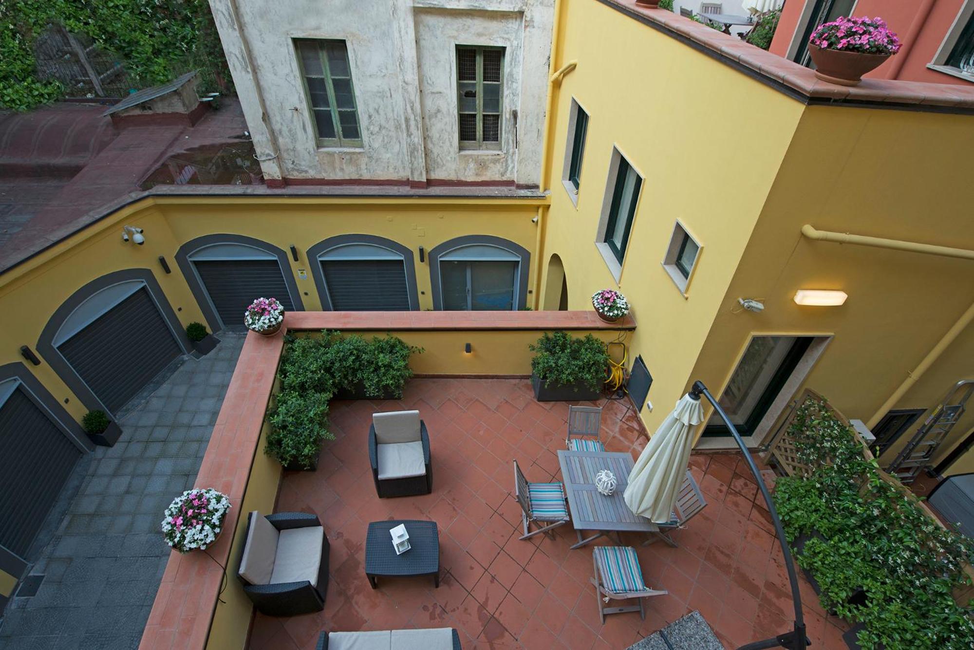 Le Terrazze sul Cortile - Amami Viaggi Collection