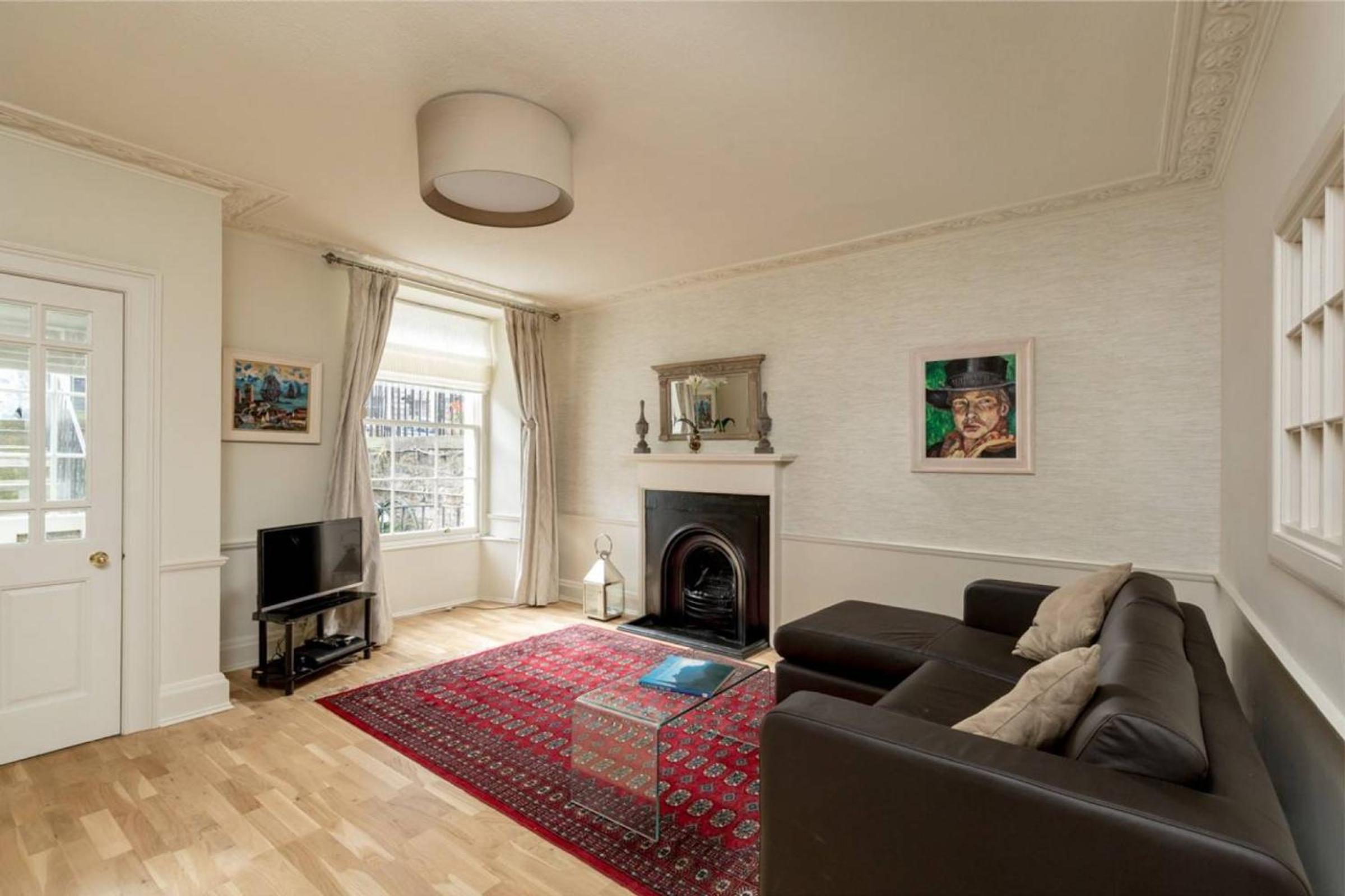 JOIVY Boutique Apt with Patio in New Town view 5
