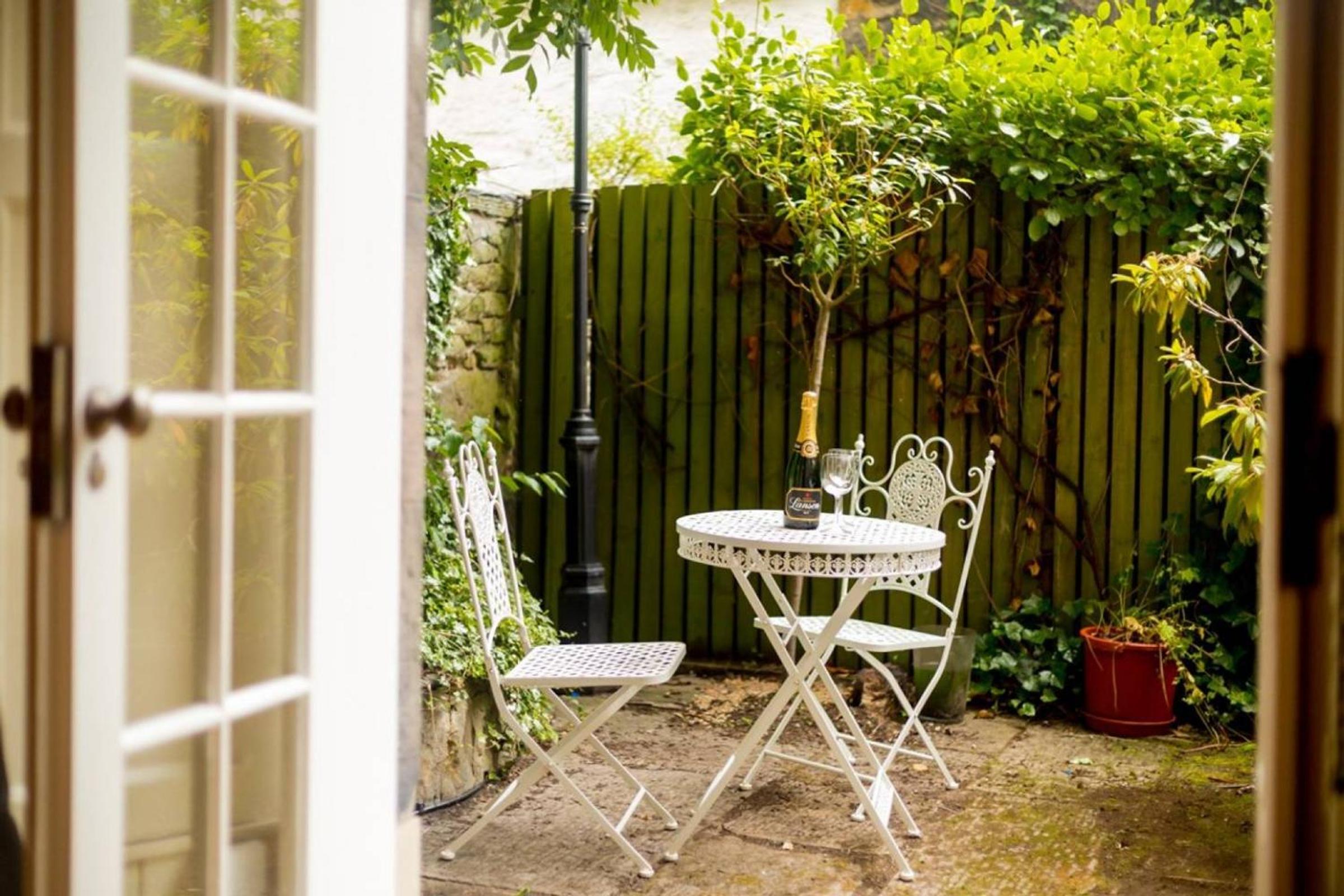 JOIVY Boutique Apt with Patio in New Town view 2